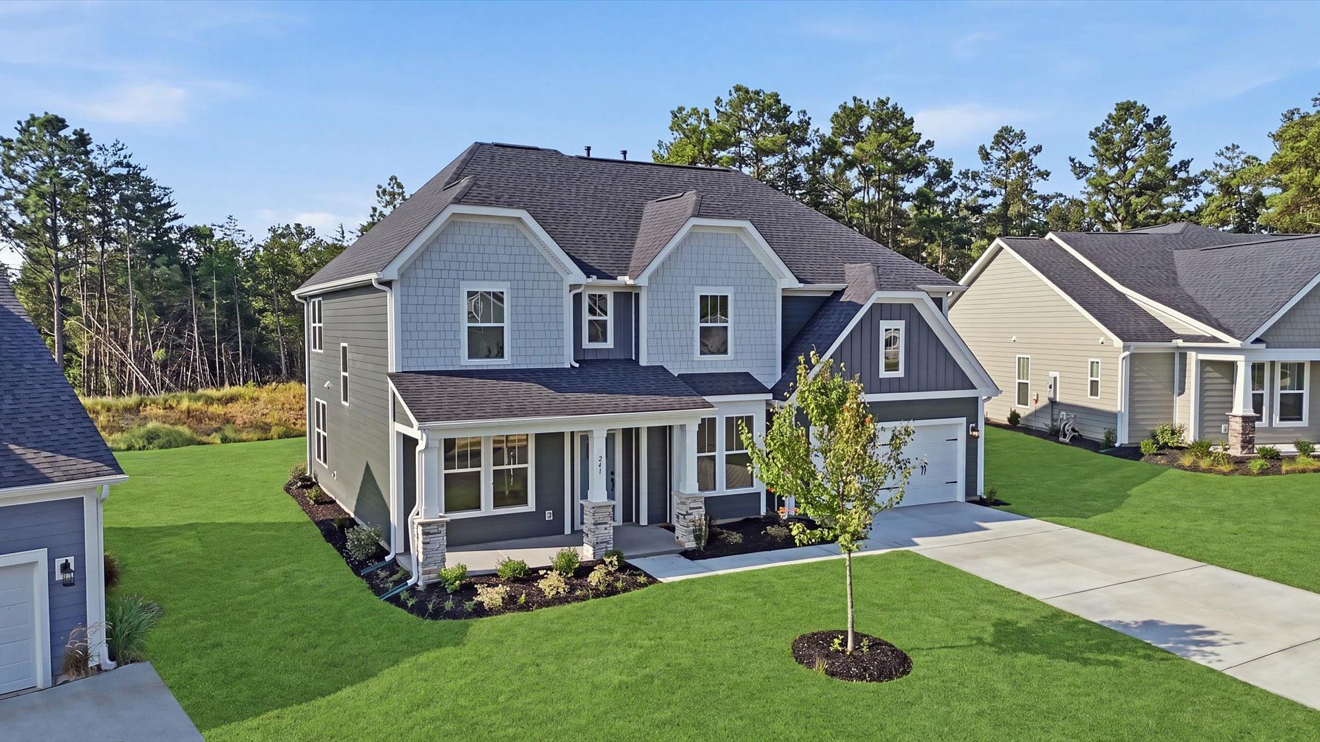 Notable street presence with tasteful elevation and thoughtful landscaping