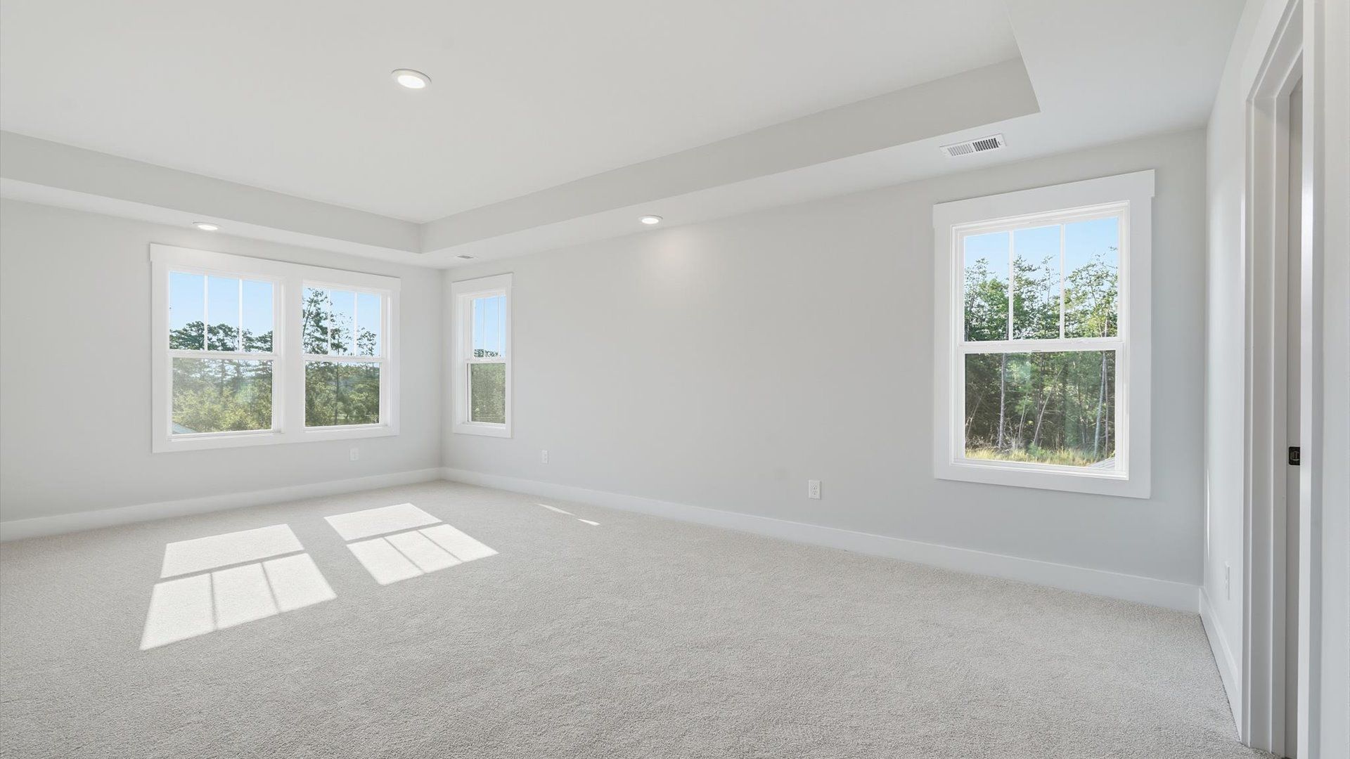 Primary suite that offers first-rate relaxation with established style and elevated finishes