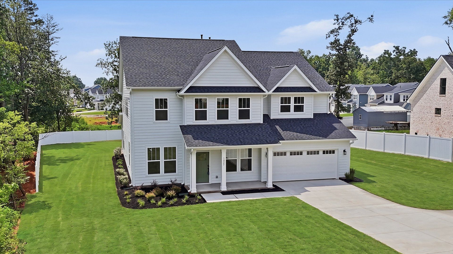Exclusive DRB Homes exterior with balanced proportions and vibrant curb appeal