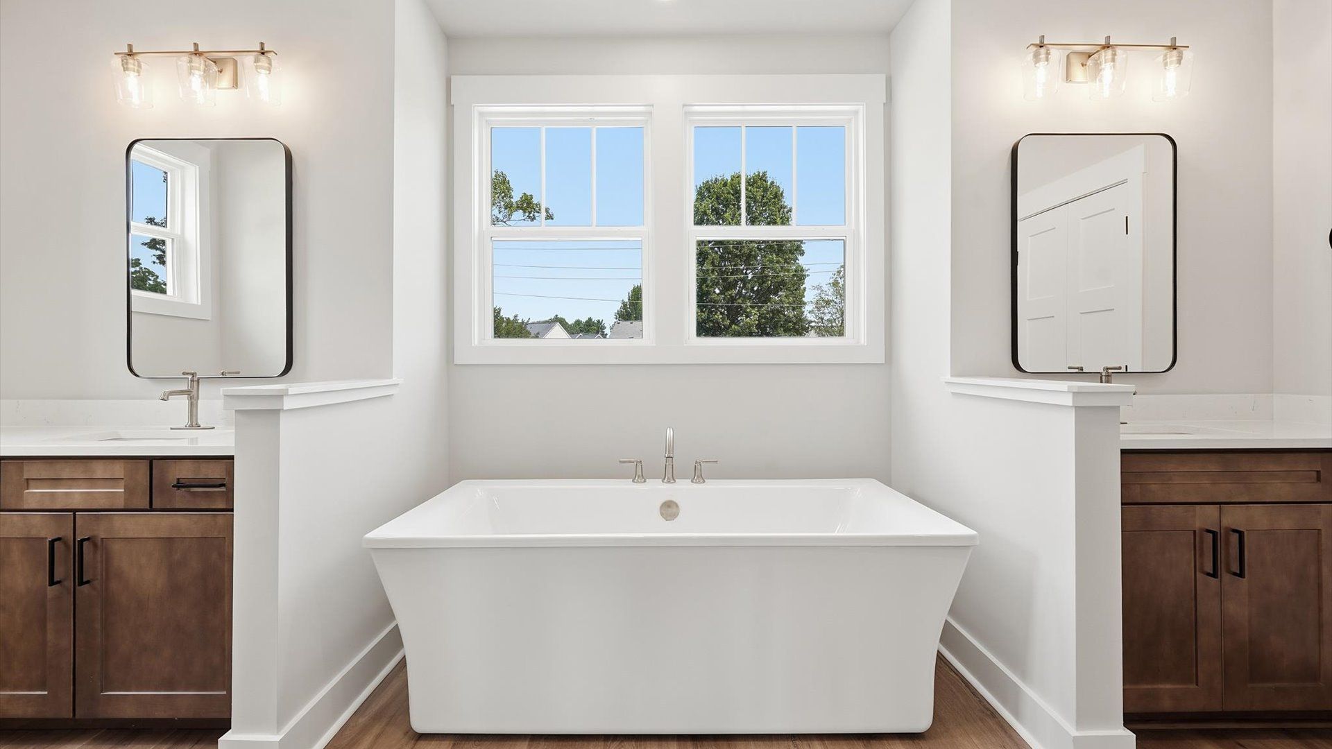 Elegant primary bathroom designed with a deep soaking tub for ultimate comfort