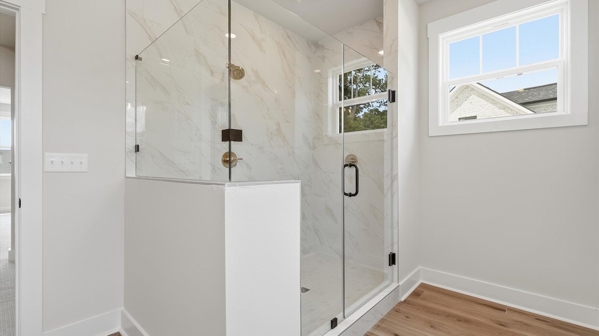Modern tiled walk-in shower designed with comfort and style in mind