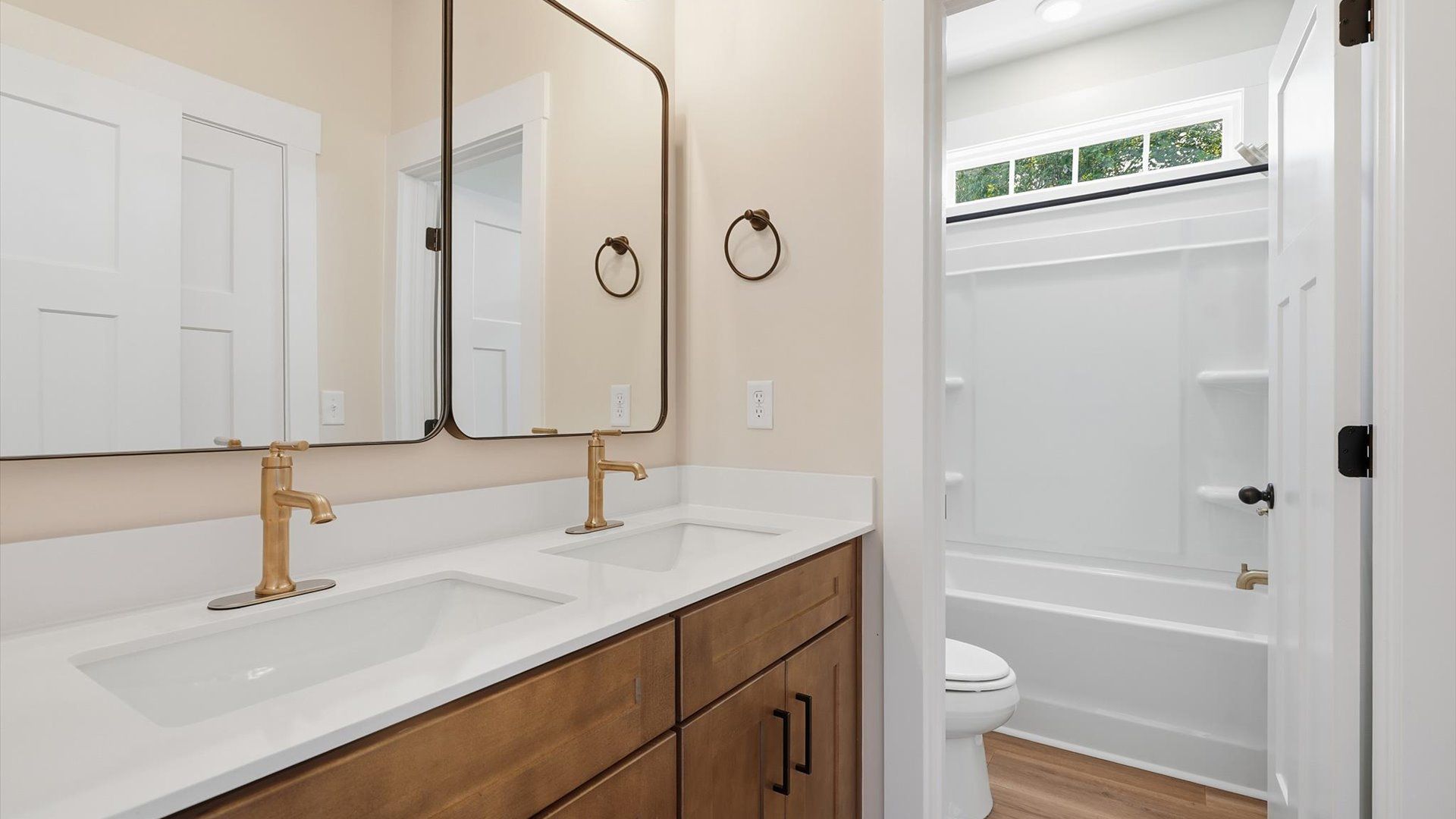 Elegant bath retreat with designer finishes and a clean, timeless aesthetic
