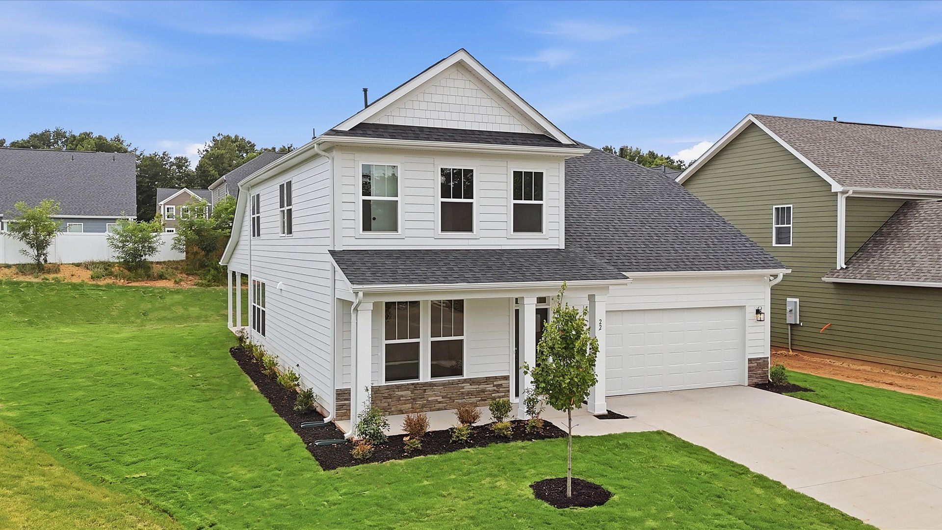 Functional design and eye-catching details in this accomplished townhome at Creeks at Midway