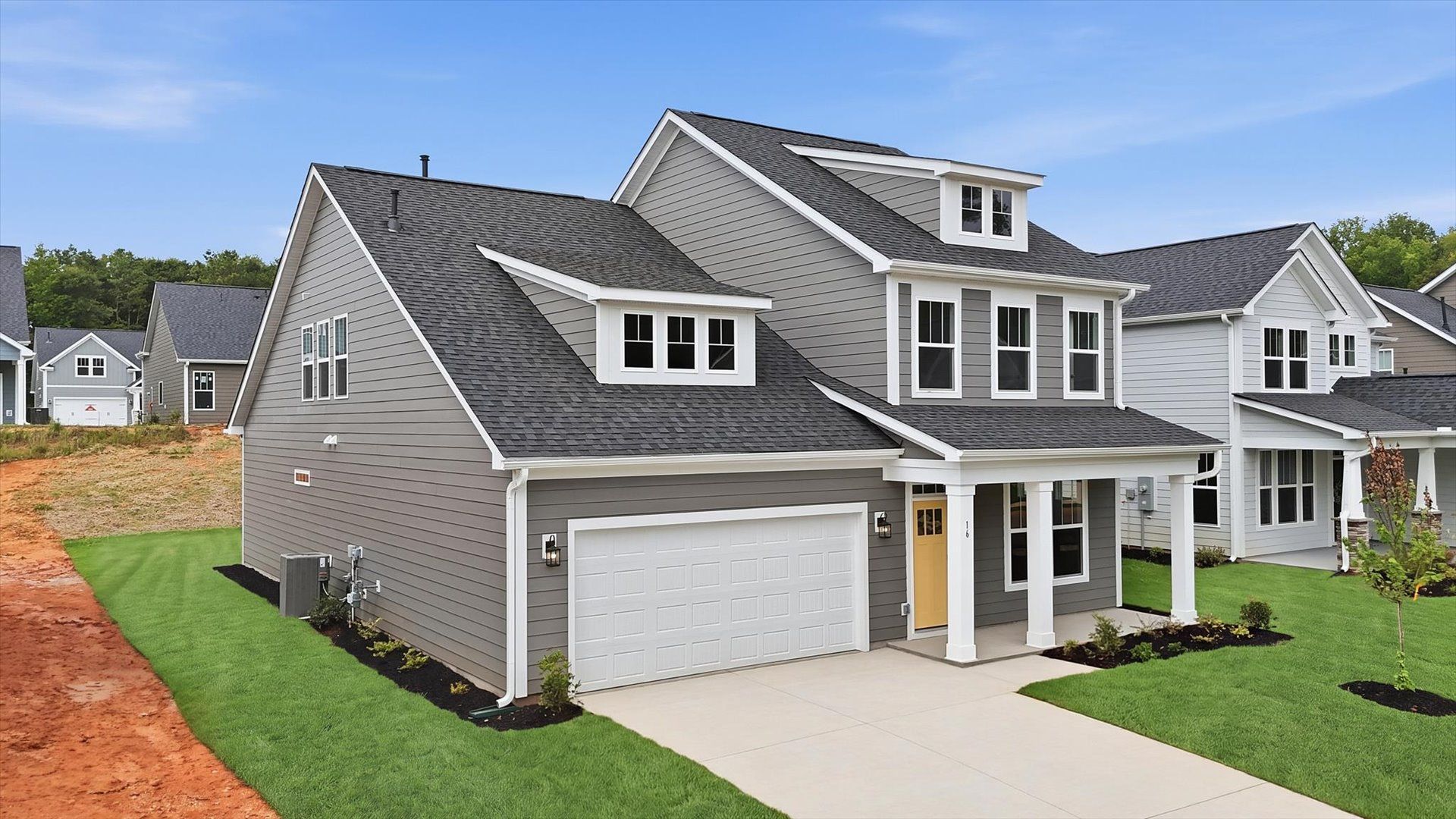 First-rate curb appeal with clean lines and a welcoming front entry
