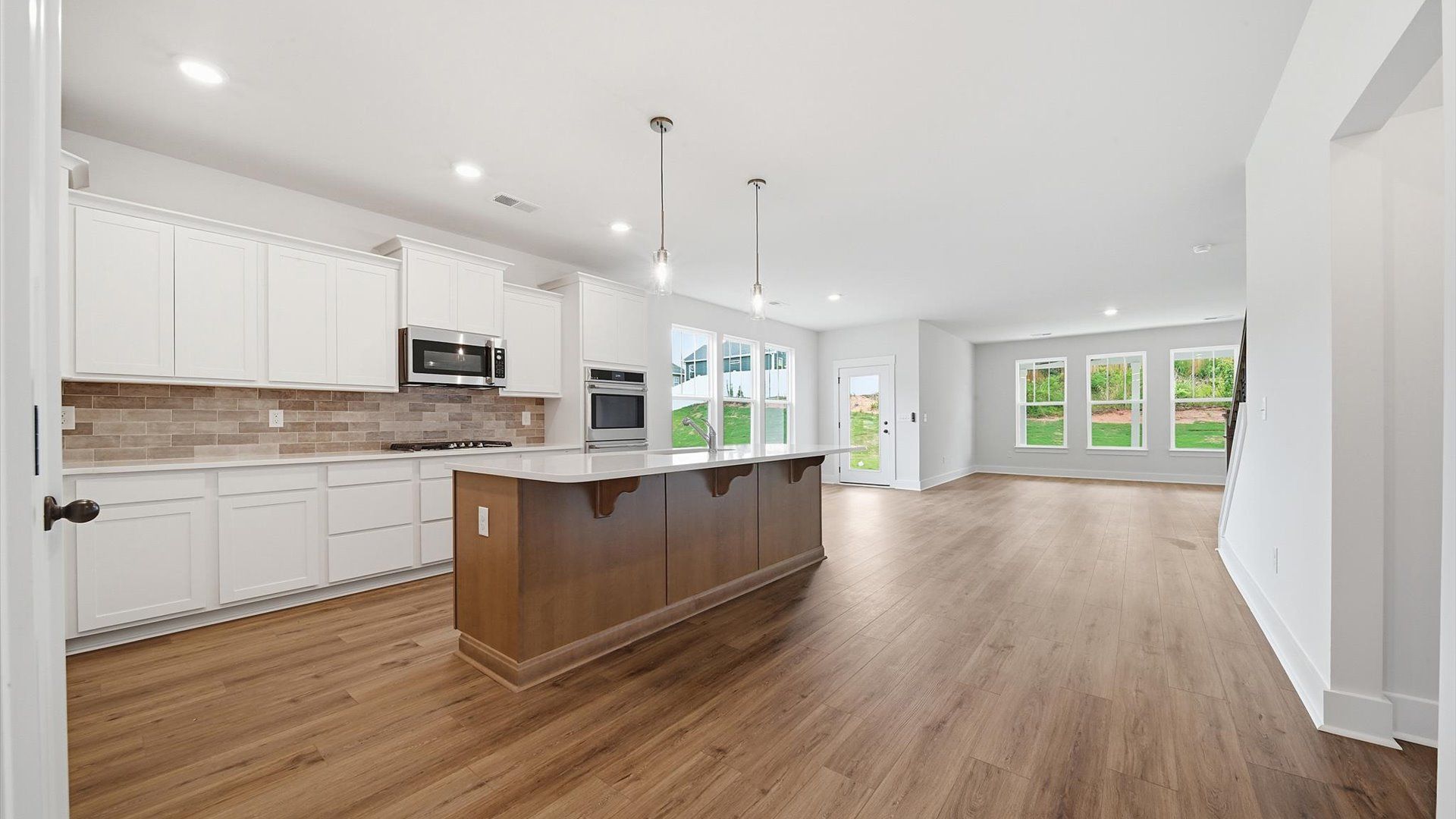 Accomplished layout with a first-class kitchen in this select community by DRB Homes