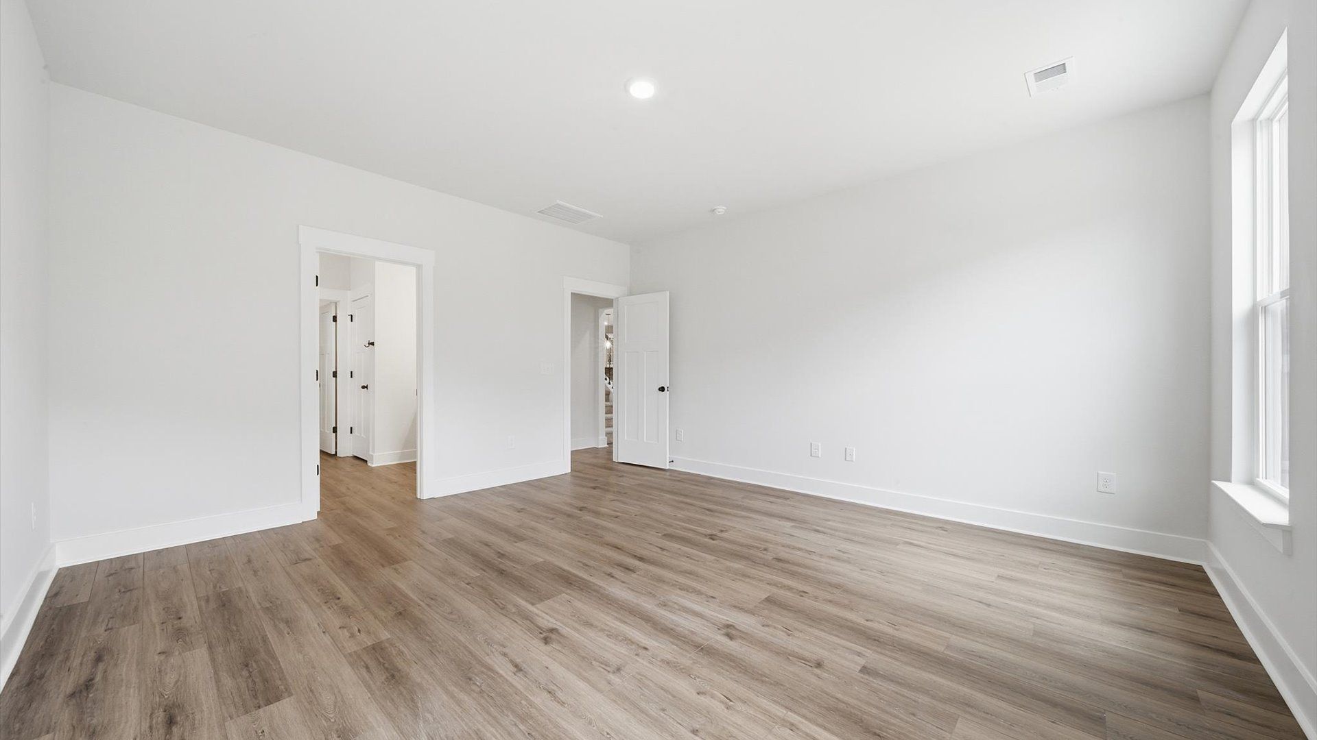 Eye-catching details and elegant finishes in the vibrant primary suite of this select home located in Anderson, SC