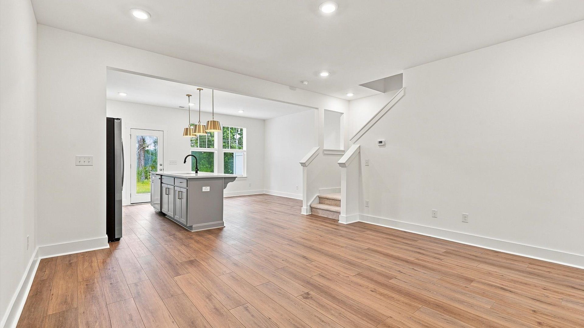 Highly functional family room with established charm and current styling in a reputable community