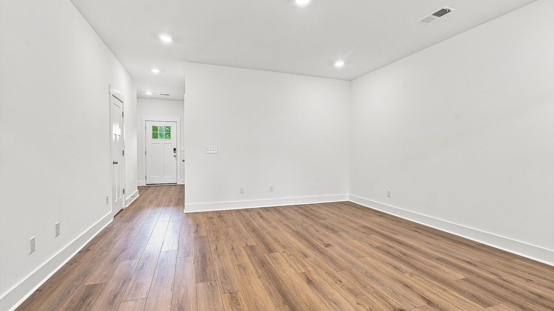 Notable family room designed with high standards—perfect for both everyday living and entertaining at Ransdell Pointe