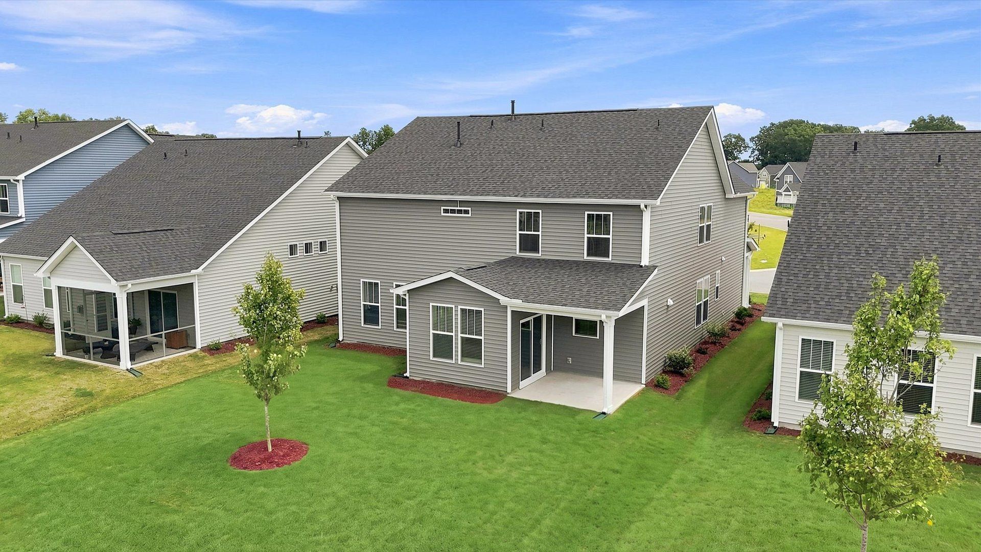 Established charm meets functional outdoor living with a spacious rear covered porch located in Inman, SC