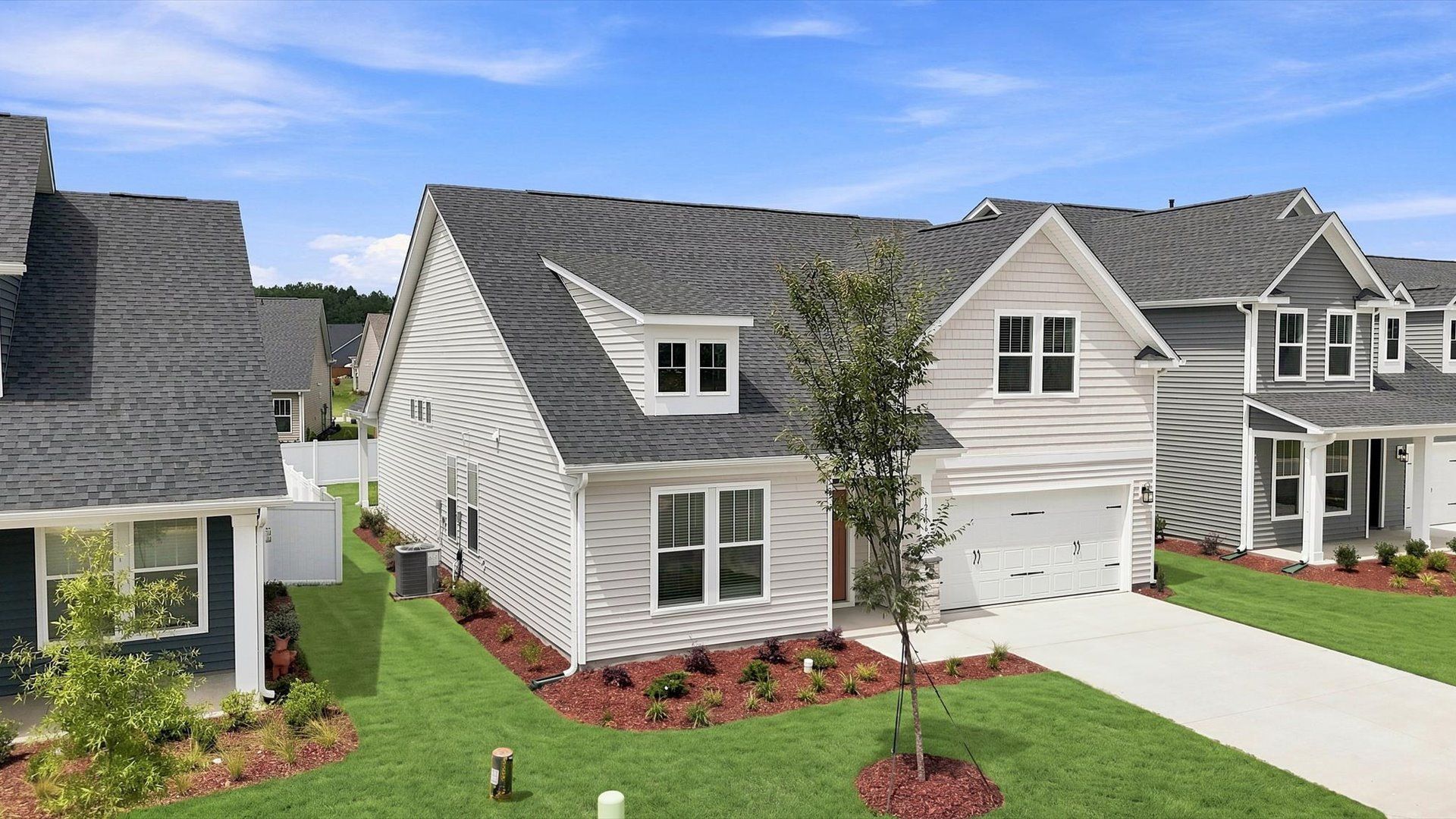 Desirable location and established charm in this superior two-story townhome community near Lake Bowen