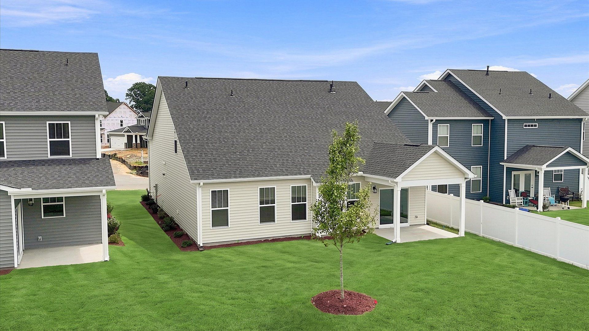 Elegant exterior with a rear covered porch—perfect for relaxing or entertaining outdoors by DRB Homes