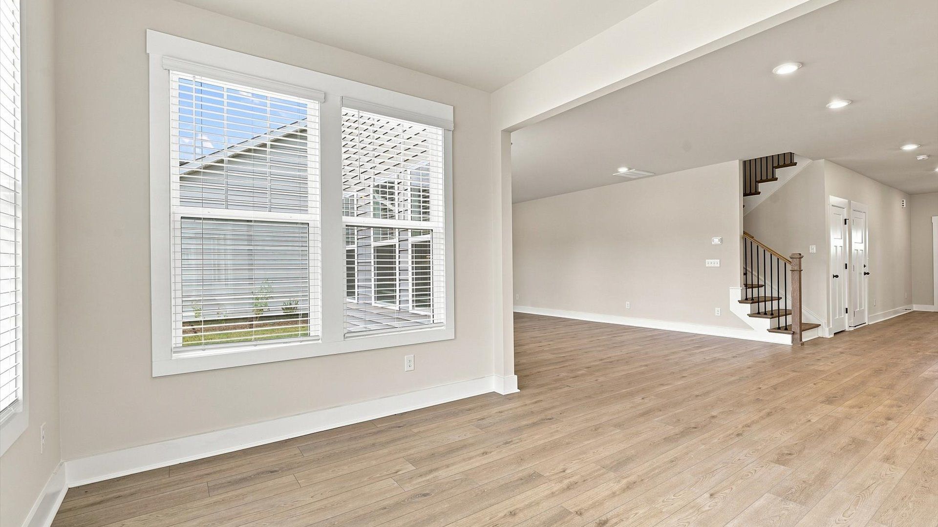 Light-filled breakfast nook offering a comfortable space to gather and unwind near Lake Bowen