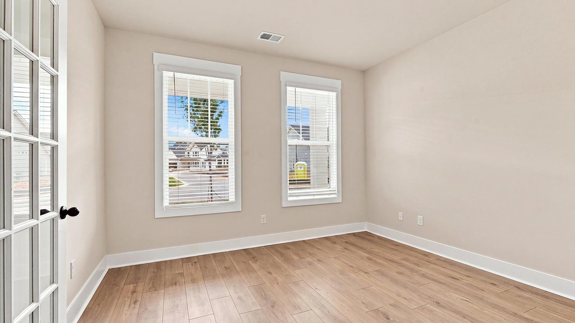 Memorable workspace with French doors, modern finishes, and exceptional light and flow at Walnut Ridge
