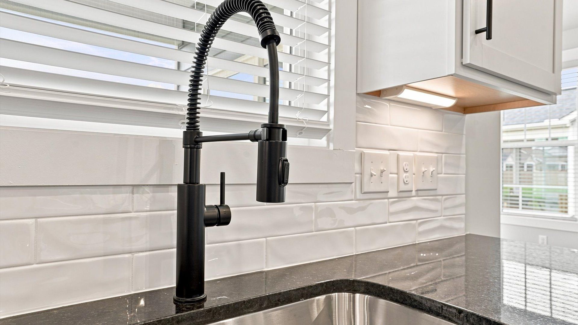 Exclusive kitchen design with natural light and tasteful finishes throughout located in Inman, SC