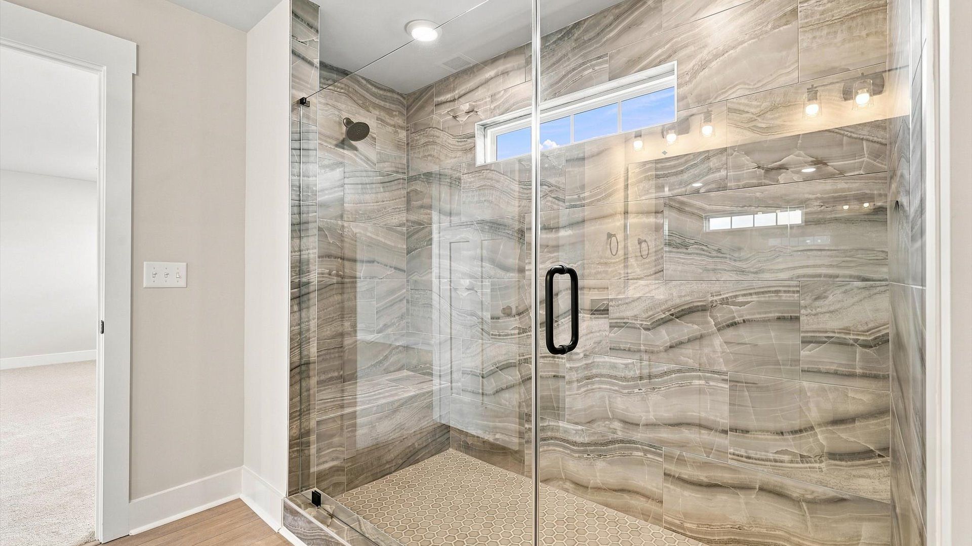 First-rate primary bathroom offering an elegant walk-in shower and superior style located in Inman, SC
