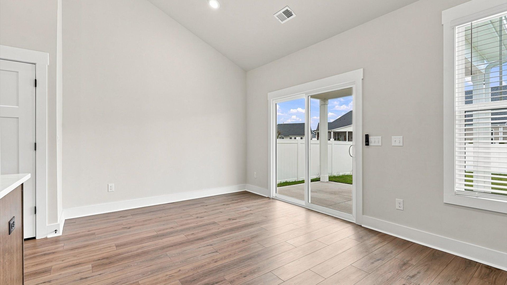 Inviting breakfast area with a seamless connection to the kitchen for everyday living at Walnut Ridge
