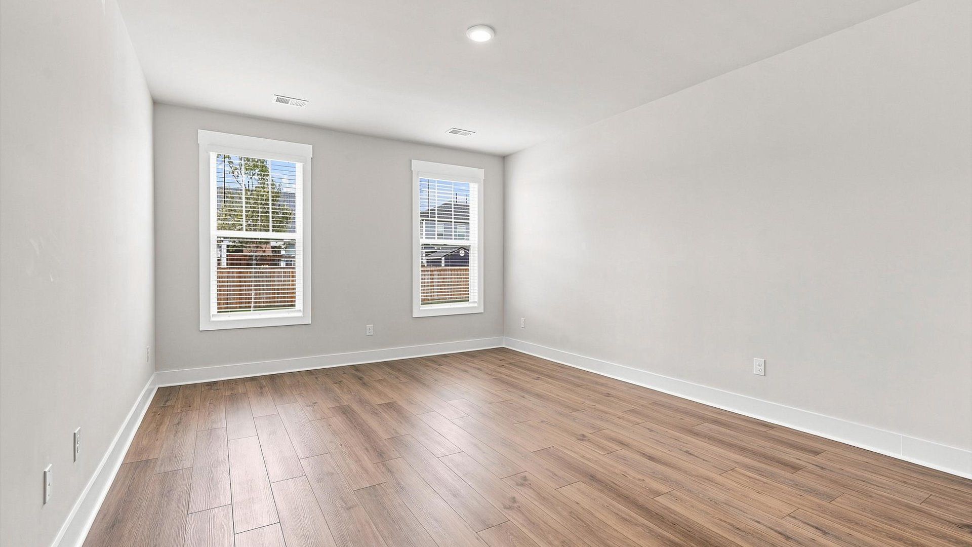 Distinguished primary bedroom featuring upscale finishes and timeless sophistication in Inman, SC
