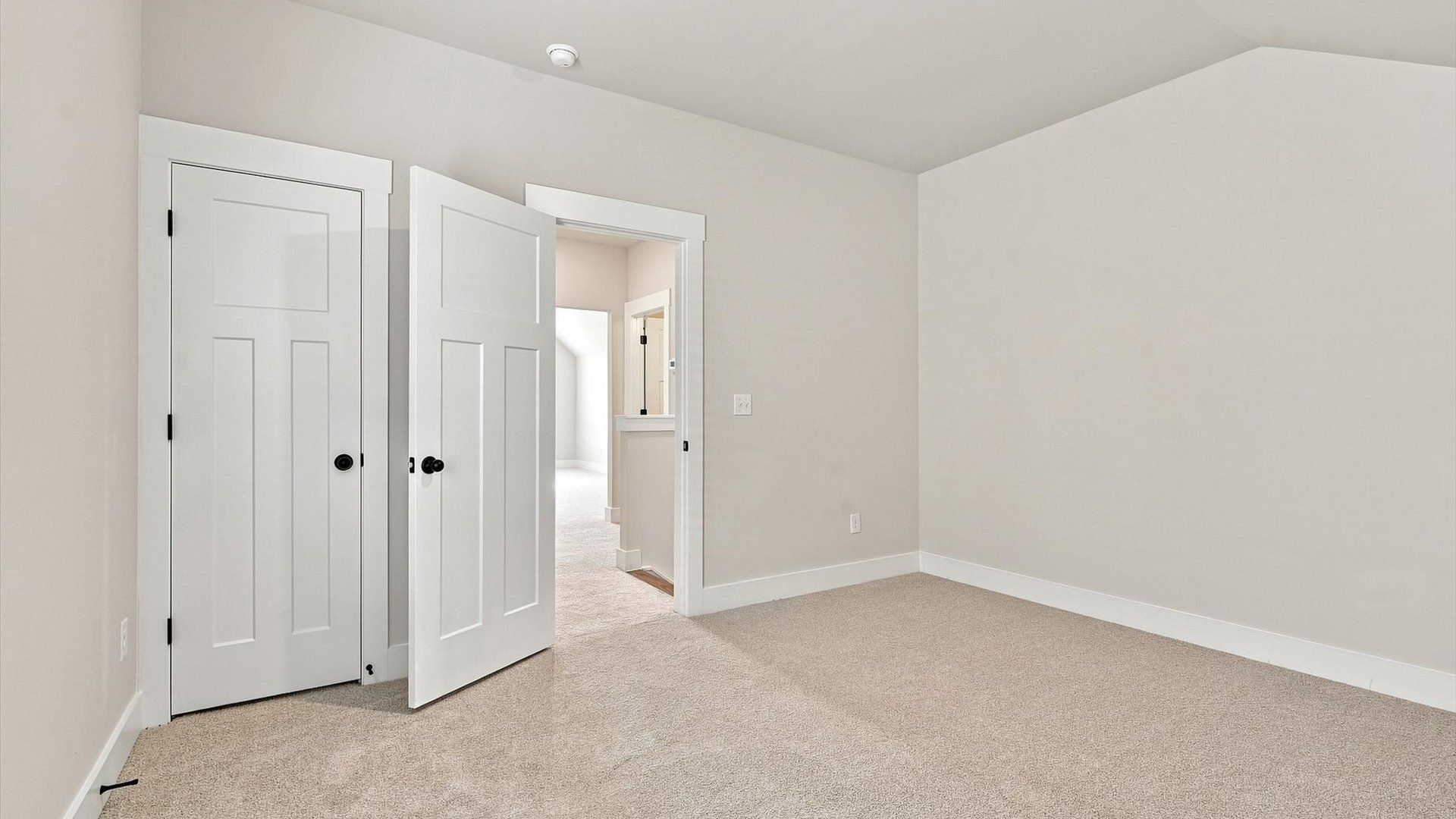 Memorable space offering plush carpet underfoot and a thoughtfully planned walk-in closet by DRB Homes