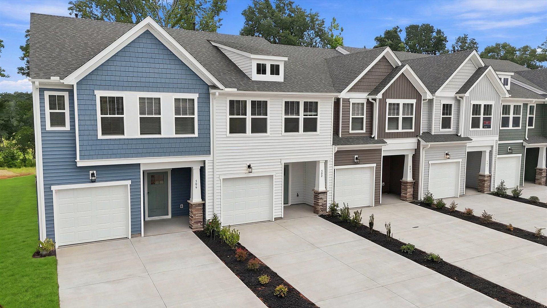Eye-catching exterior with timeless color palette and superior architectural detail by DRB Homes