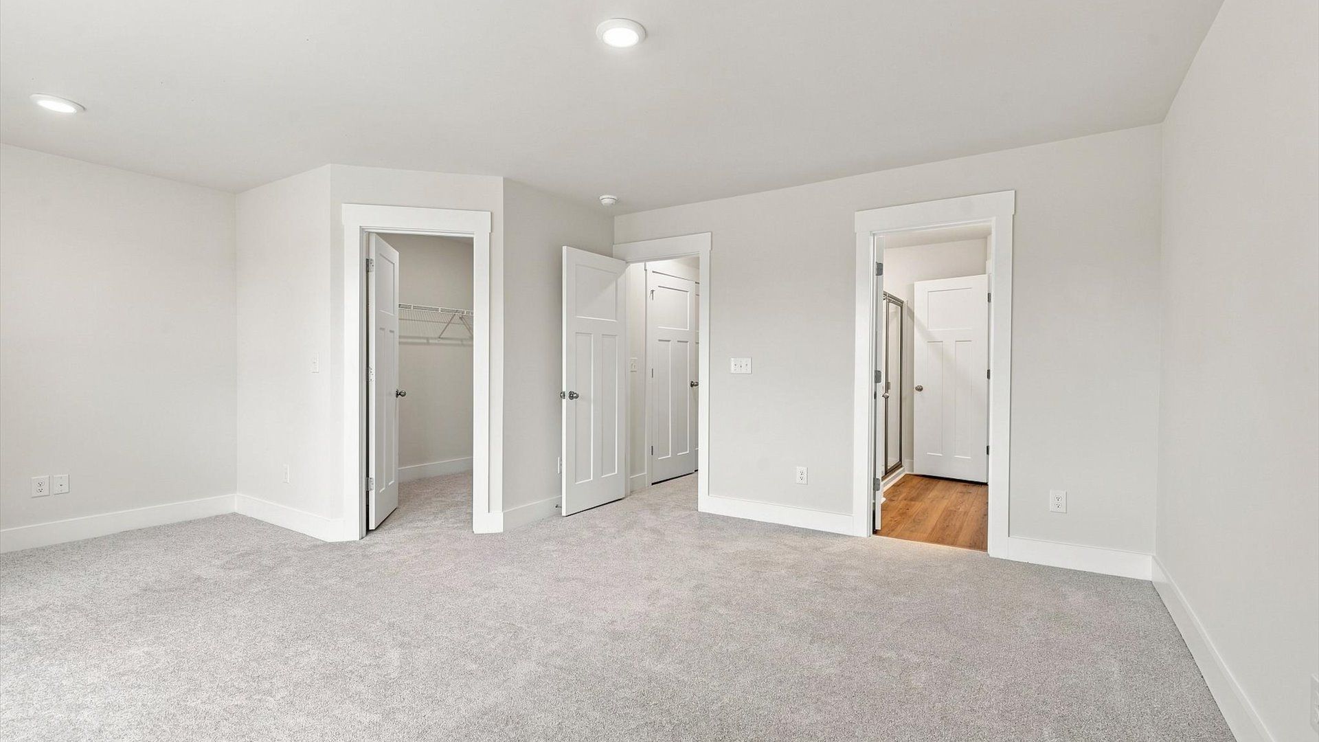 Eye-catching details and elegant finishes in the vibrant primary suite of this select home at Ransdell Pointe