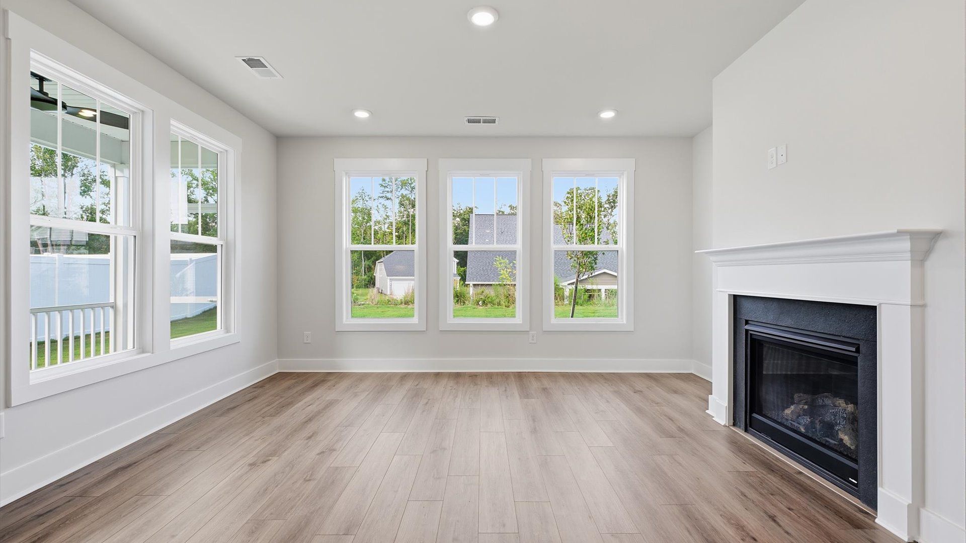 First-rate living space with tasteful hardwood floors and a functional open-concept design