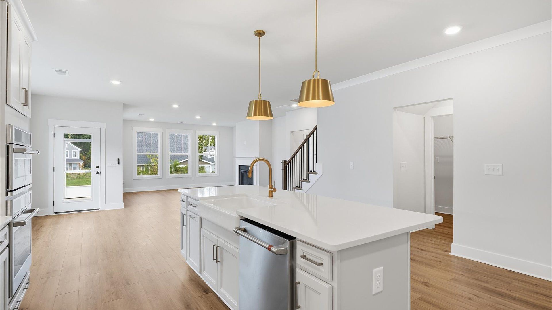 Exclusive kitchen design with large island, pendant lights, and tasteful finishes throughout near Lake Hartwell