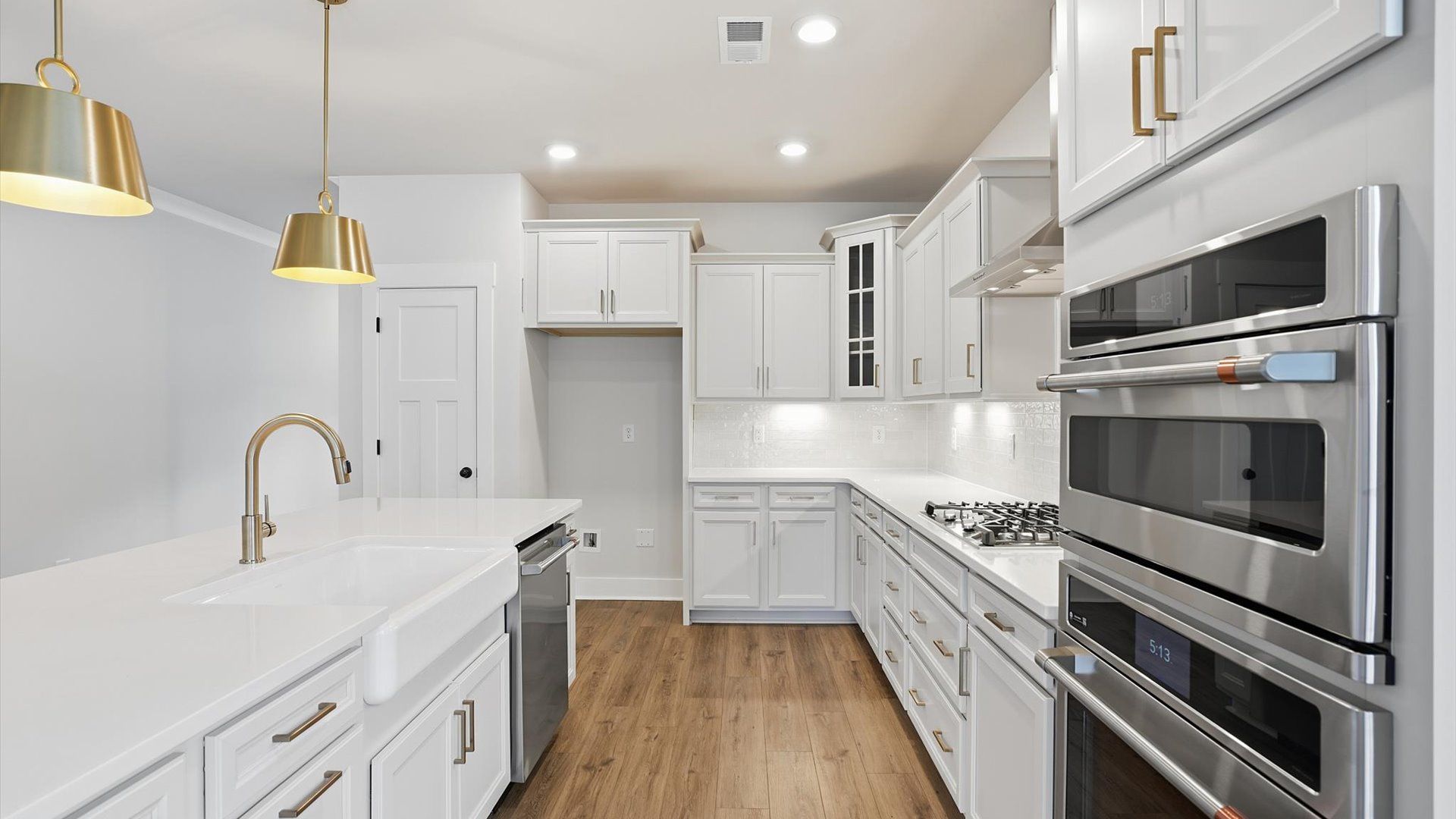 Luxury-inspired kitchen featuring expansive prep space and elegant design elements near Downtown Anderson