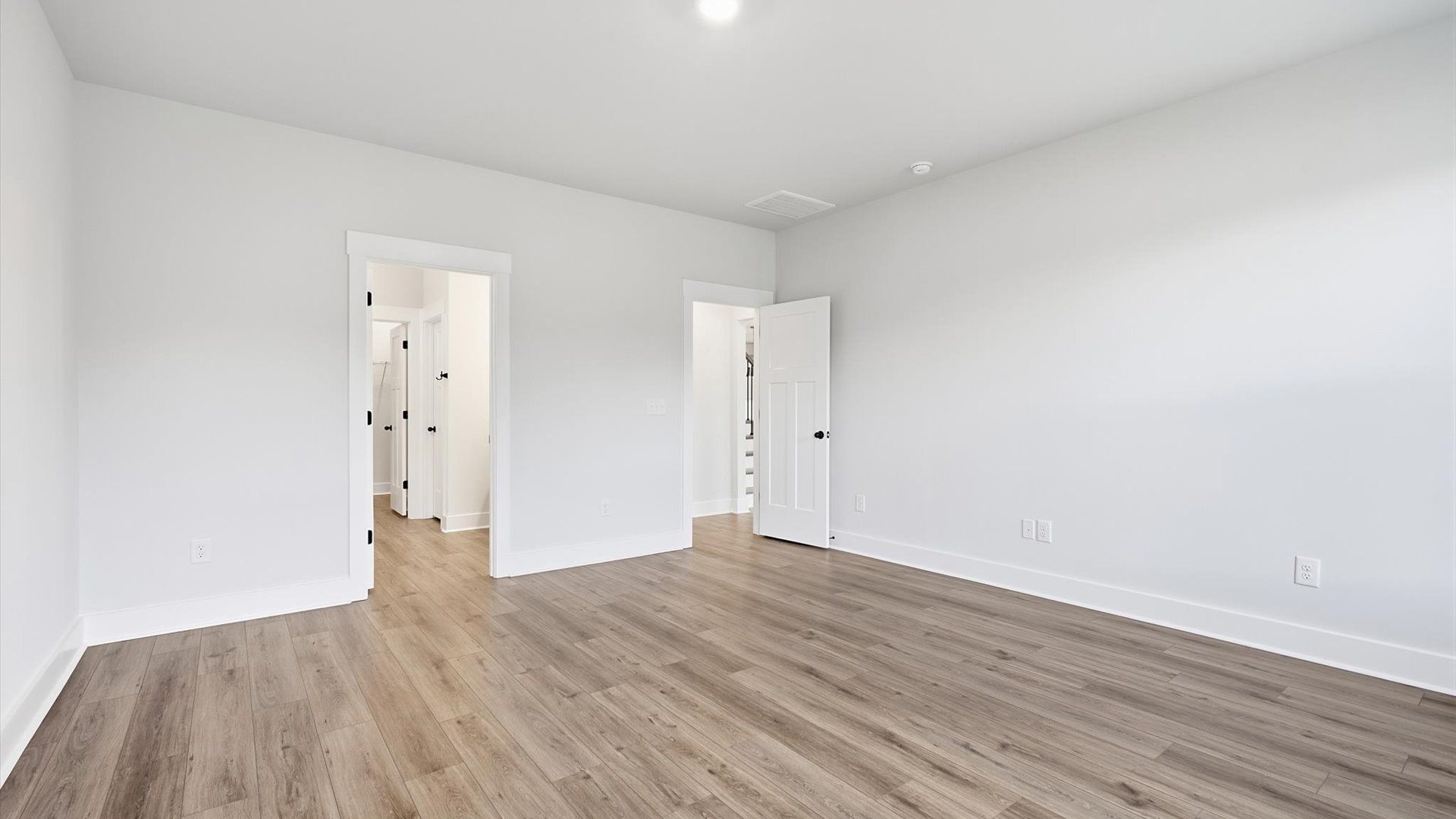 Elegant and functional primary suite in our reputable Creeks at Midway community
