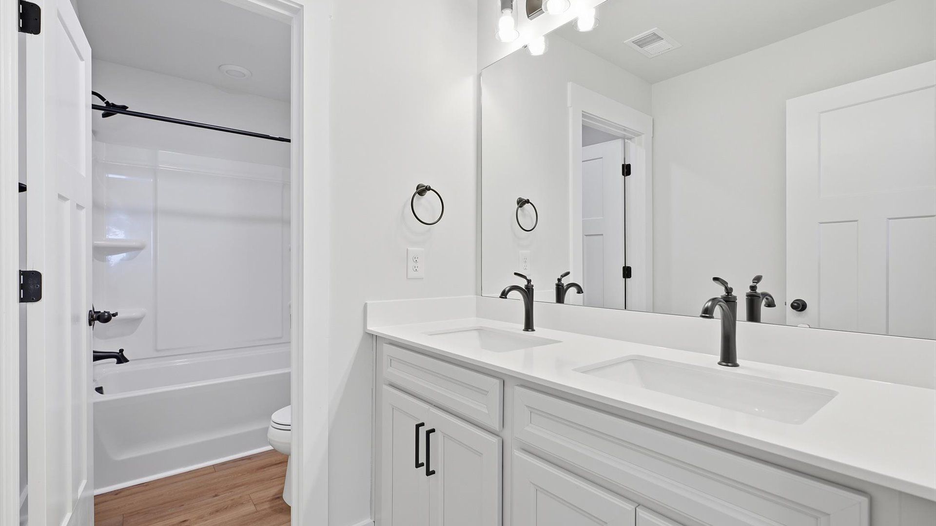 Well-appointed full bath with high standards of craftsmanship and everyday function