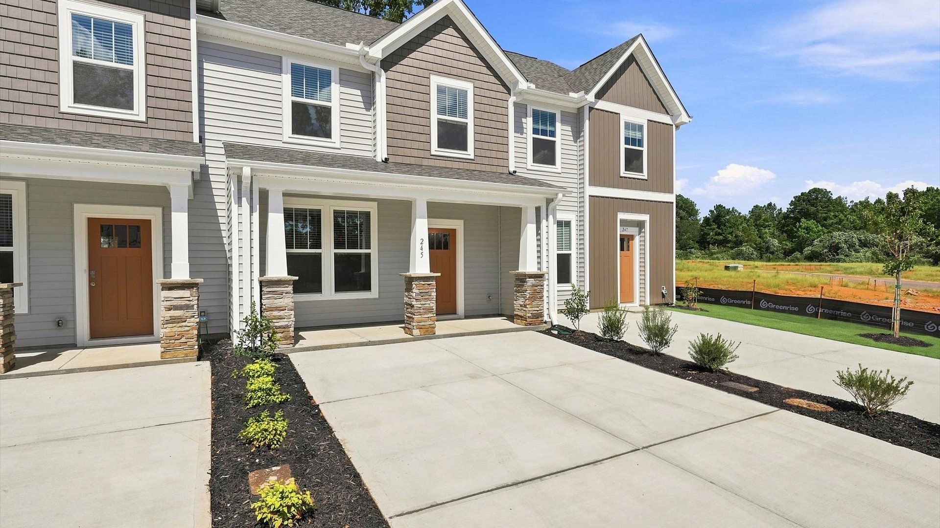 Desirable location and established charm in this superior two-story villa community near Downtown Anderson