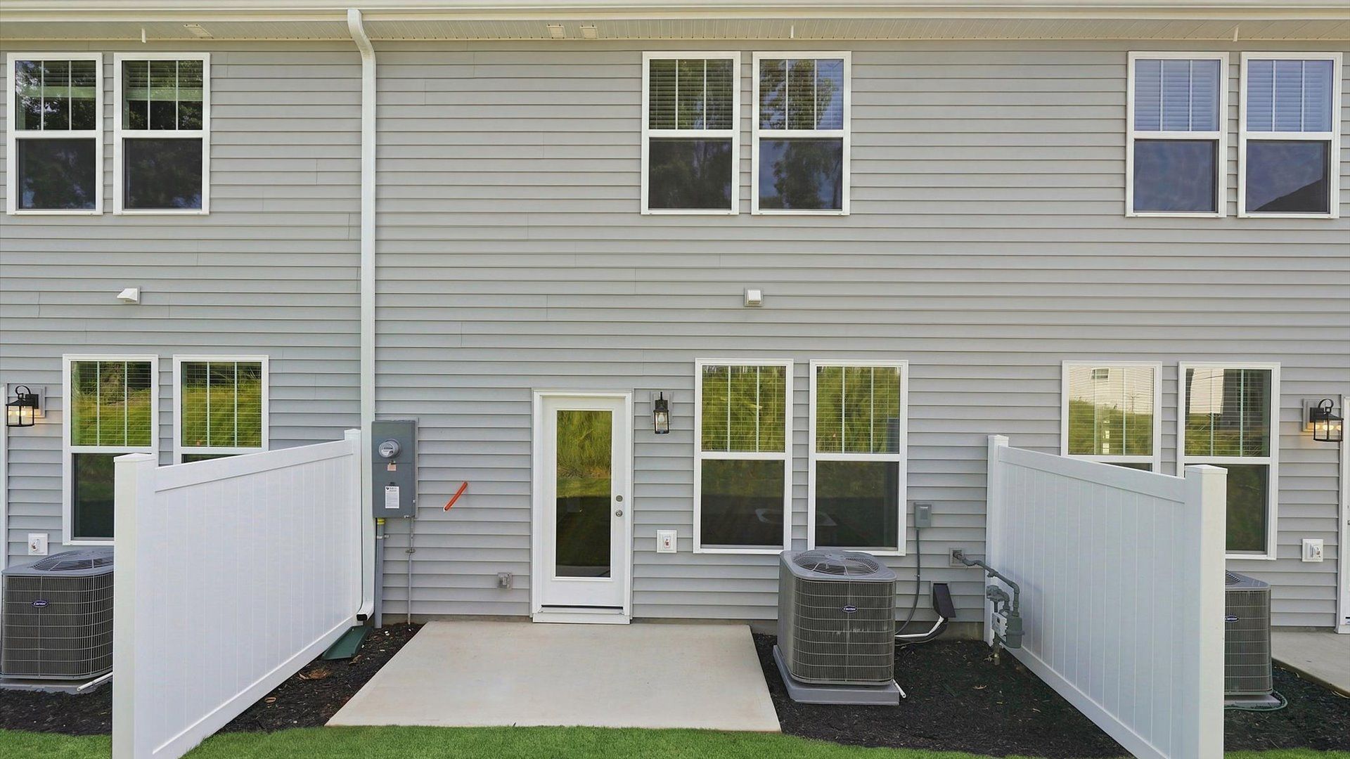 Exclusive rear patio with accomplished detail and elevated outdoor living potential at Clarke Townes