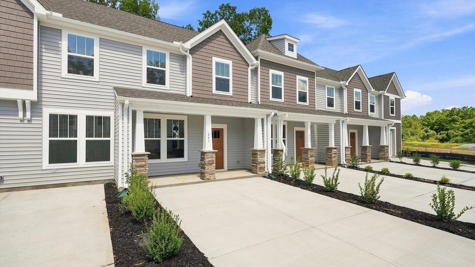 Exclusive DRB Homes exterior with balanced proportions and vibrant curb appeal