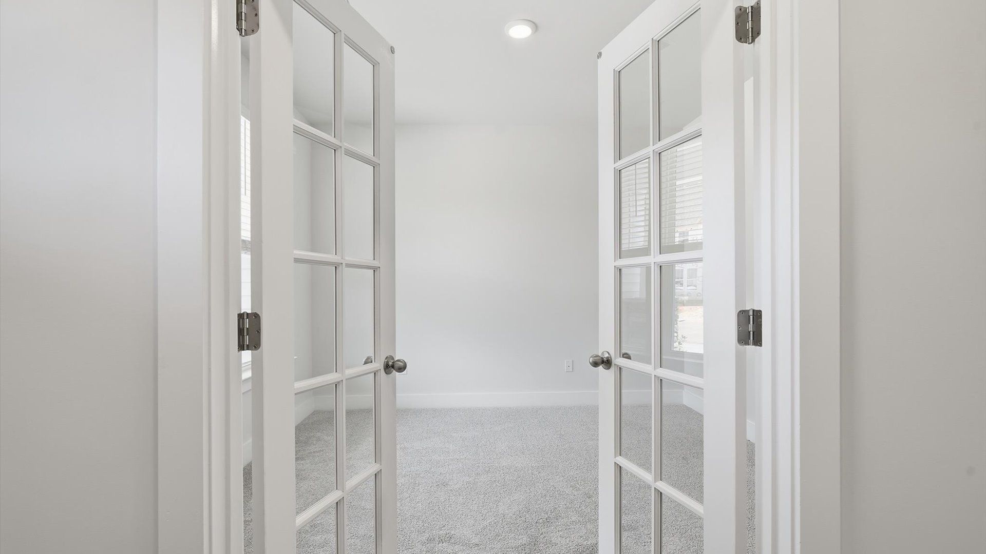 Elegant and flexible French door study ideal for remote work, reading, or creative space at Clarke Townes
