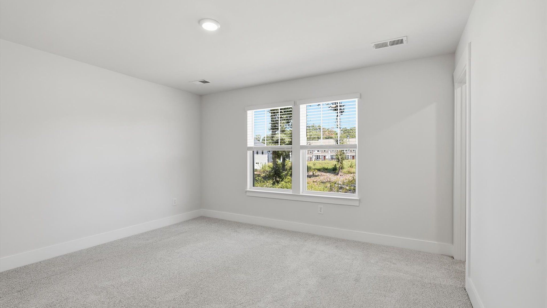 Highly skilled design shines in this elegant, restful primary suite near Downtown Anderson