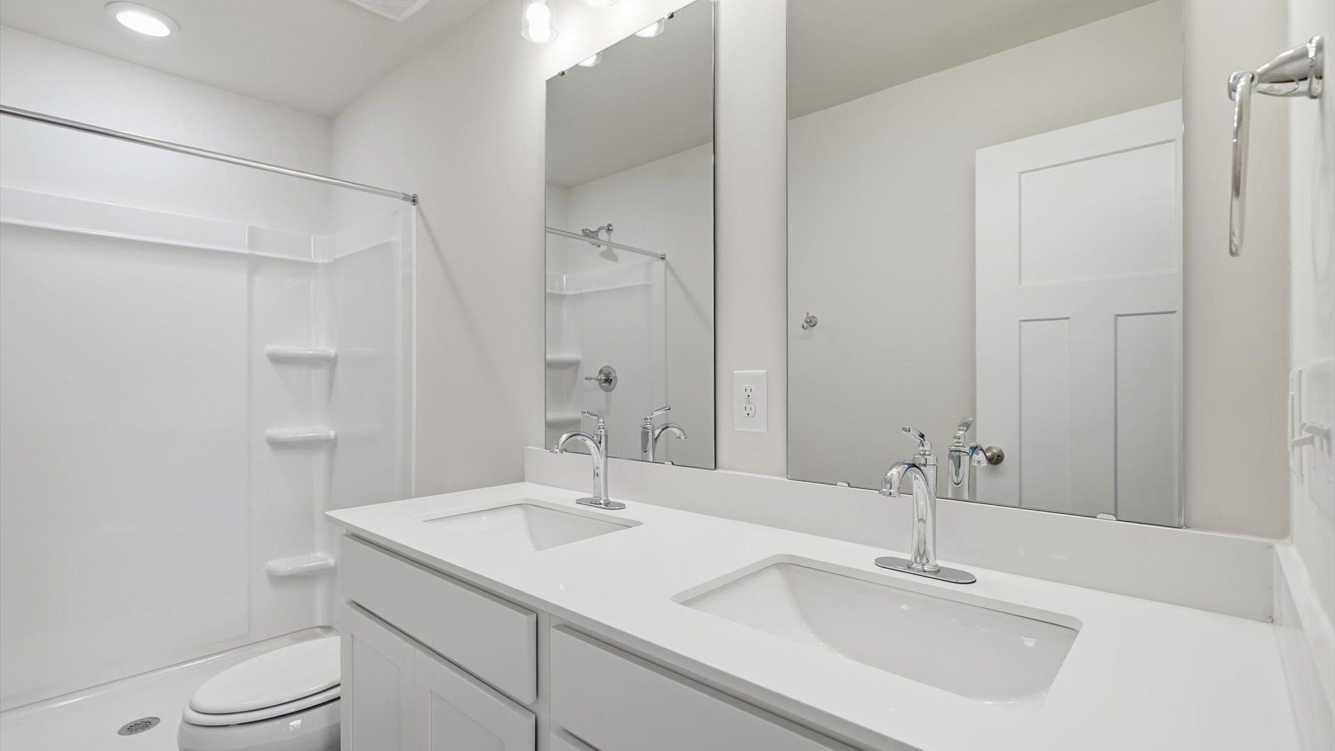 Tasteful primary bath with modern finishes, a walk-in shower, and thoughtful double vanity layout near Lake Hartwell