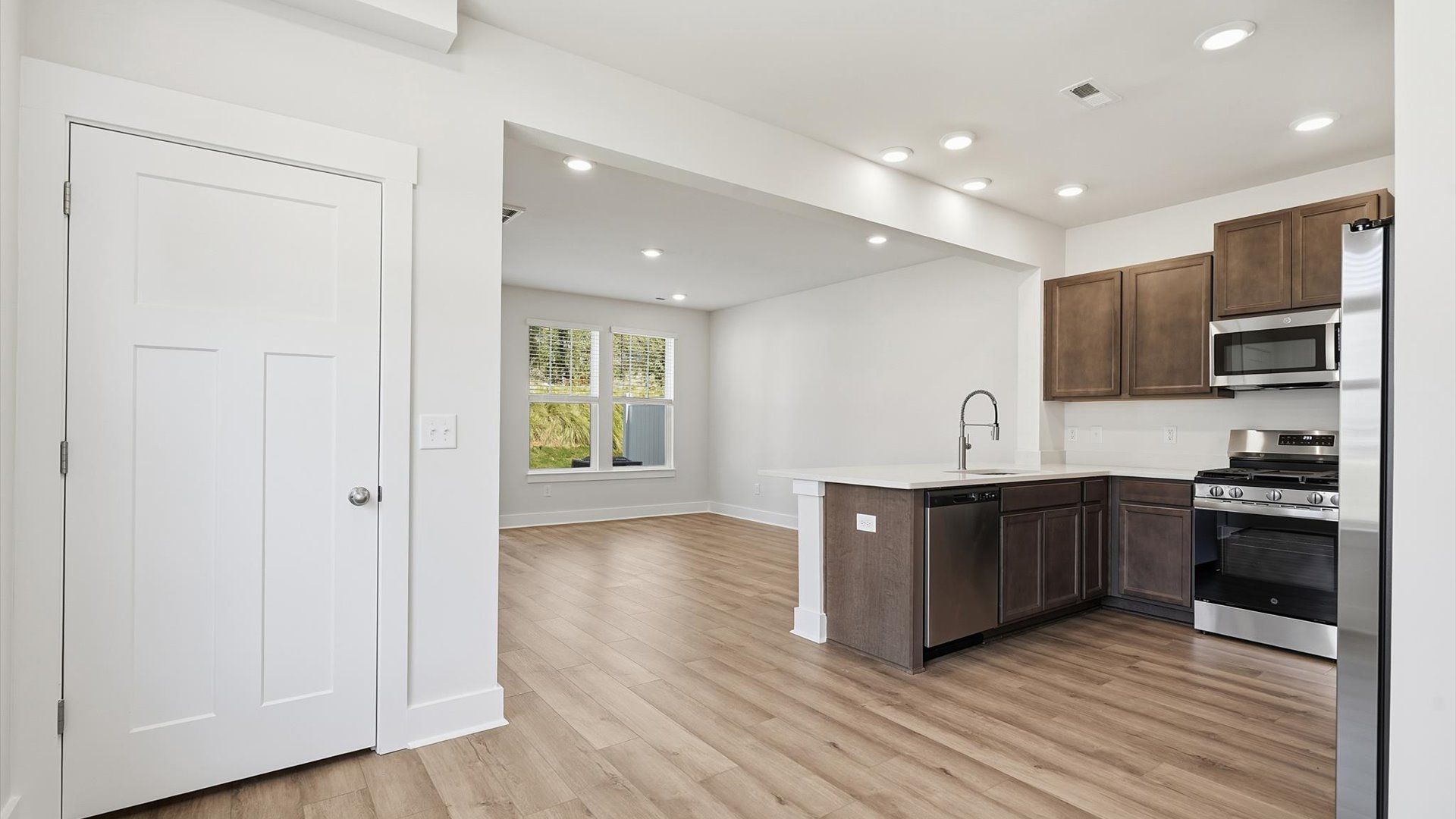 Memorable meals start in this exclusive dining space featuring elegant trim and natural light in Anderson, SC
