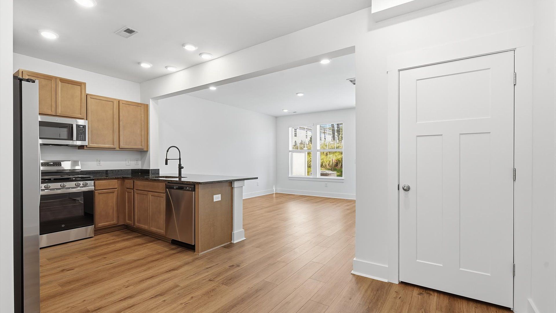 Tasteful dining area with current design in this vibrant two-story villa near Lake Hartwell
