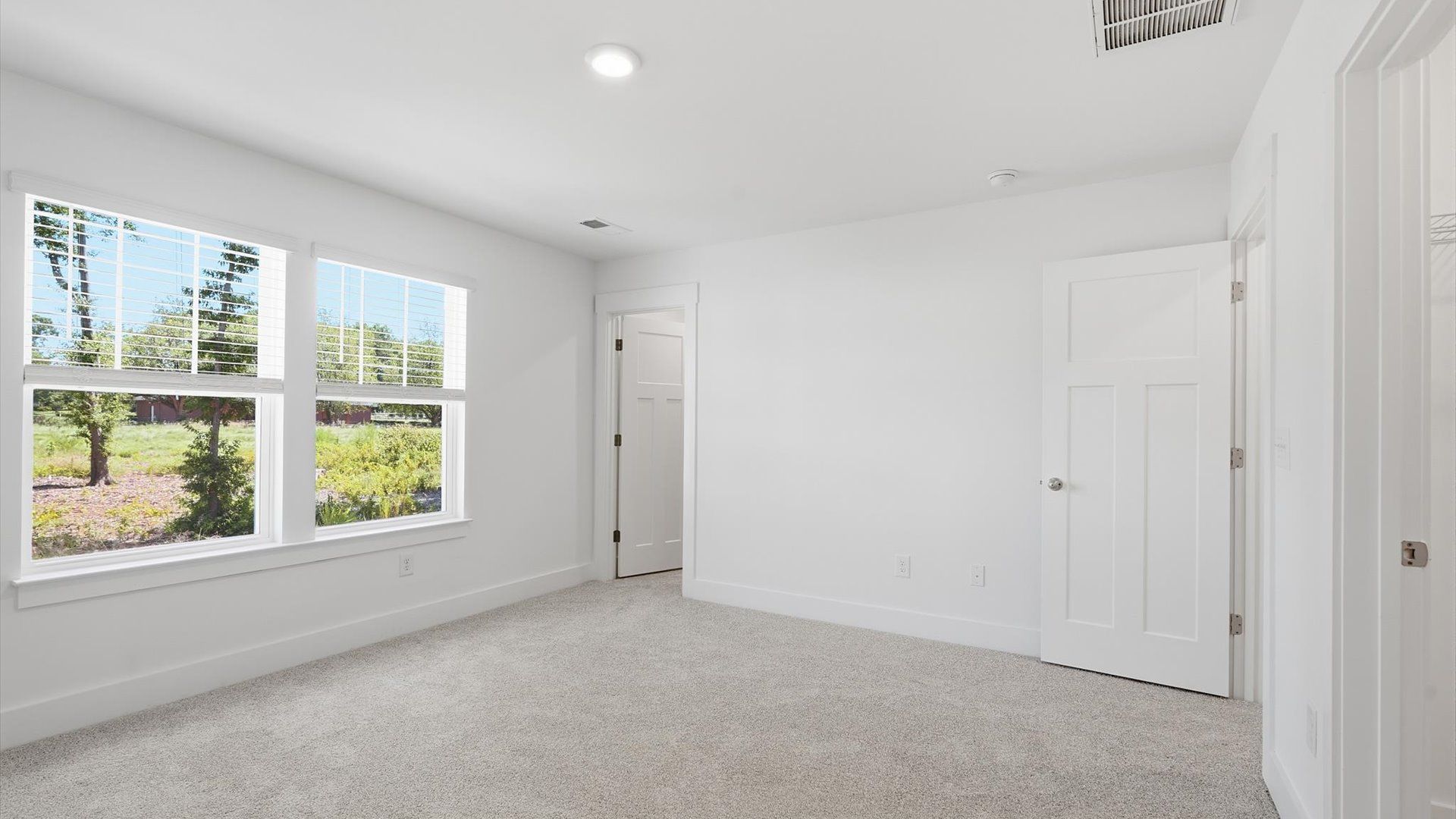 Eye-catching details and elegant finishes in the vibrant primary suite of this select home in Anderson, SC