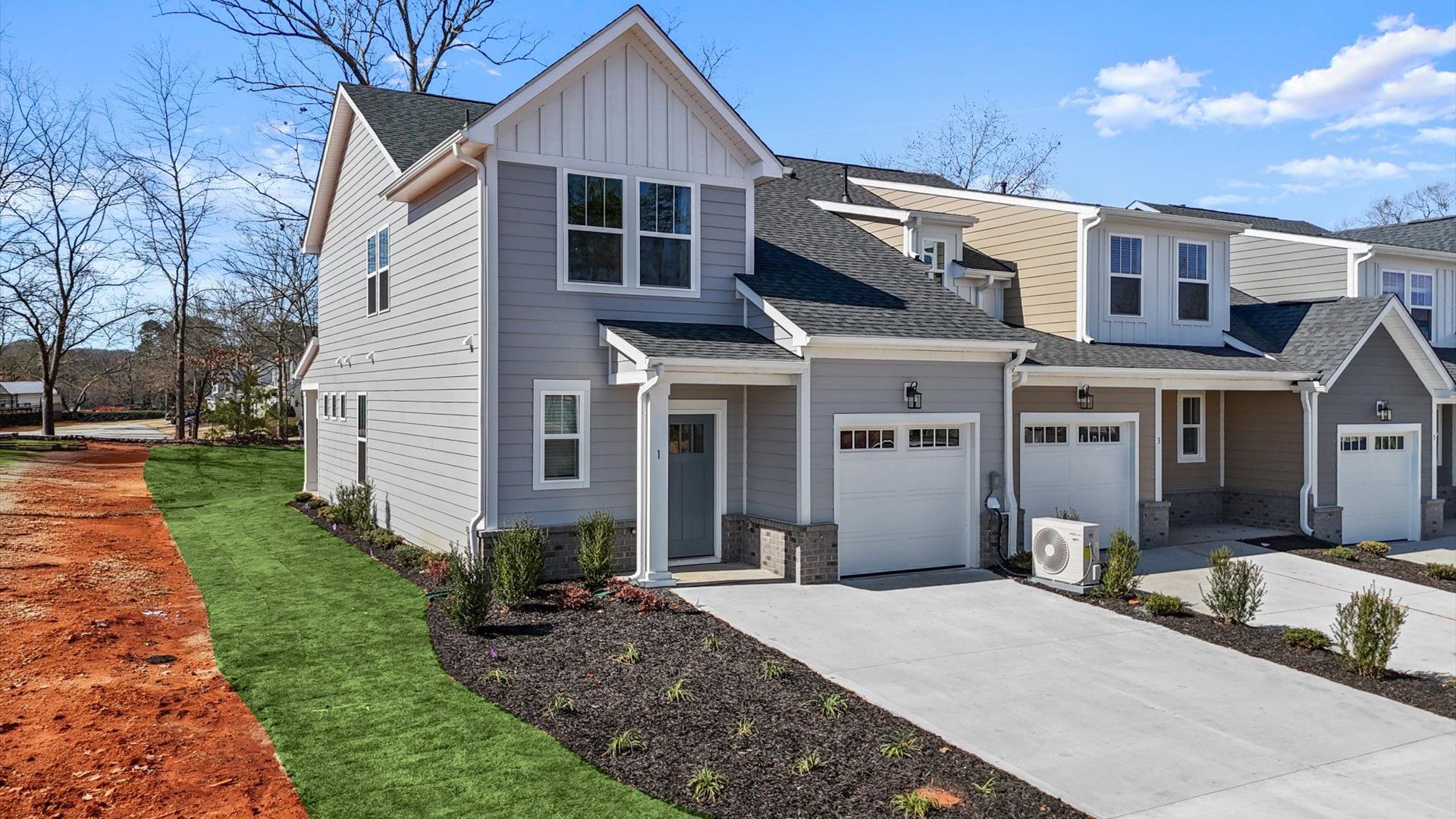 Stylish front elevation with accomplished design and high standards throughout at this Lawson design villa in Greenville, SC