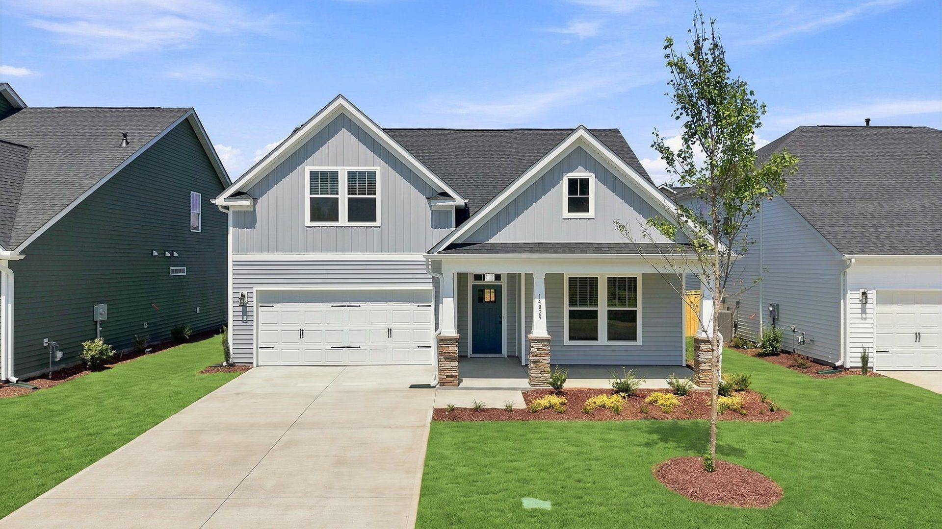 Exceptional home with tasteful exterior finishes and a thoughtfully designed façade