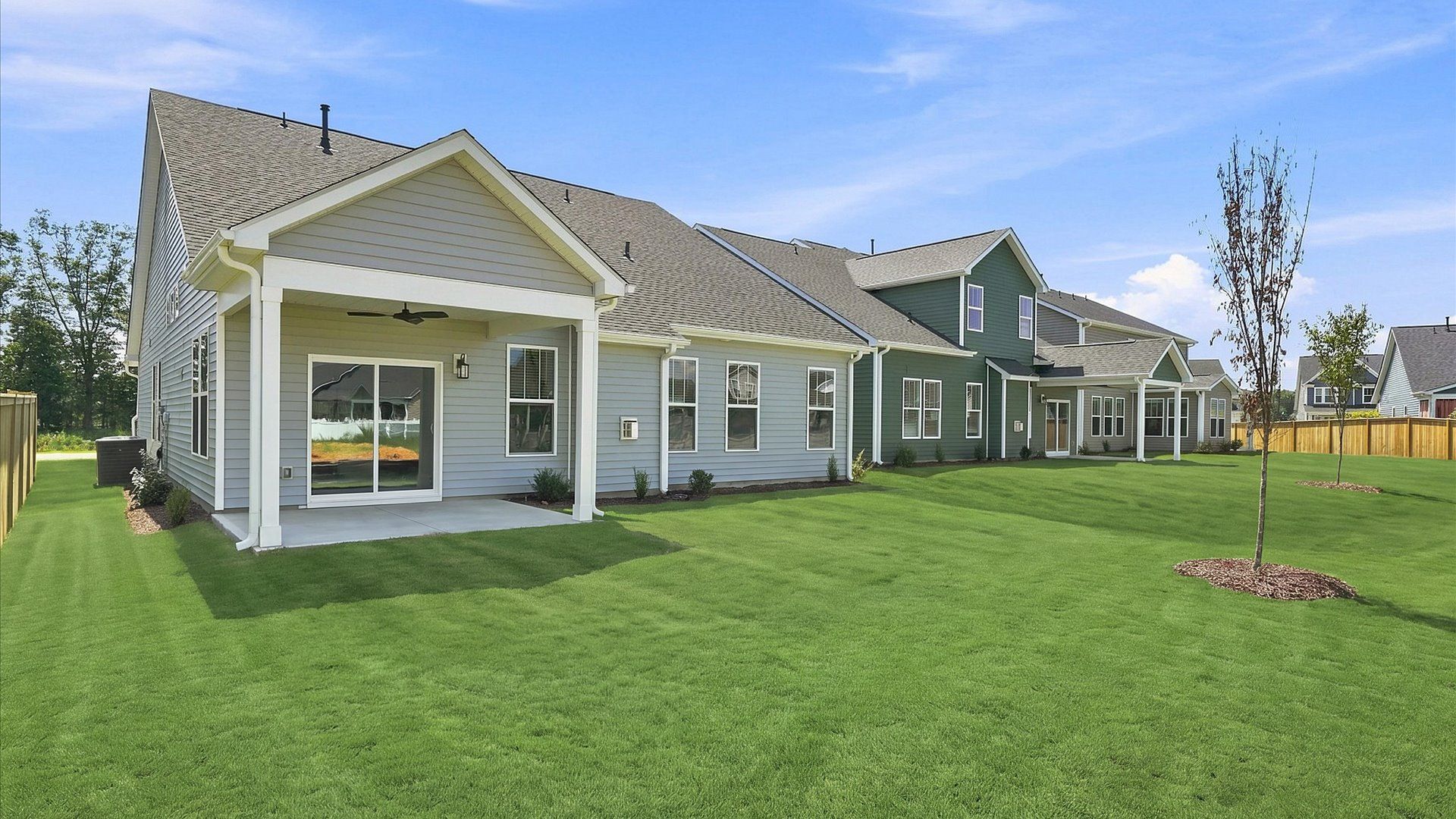 Warm and inviting outdoor living space with a covered rear porch and tasteful finishes