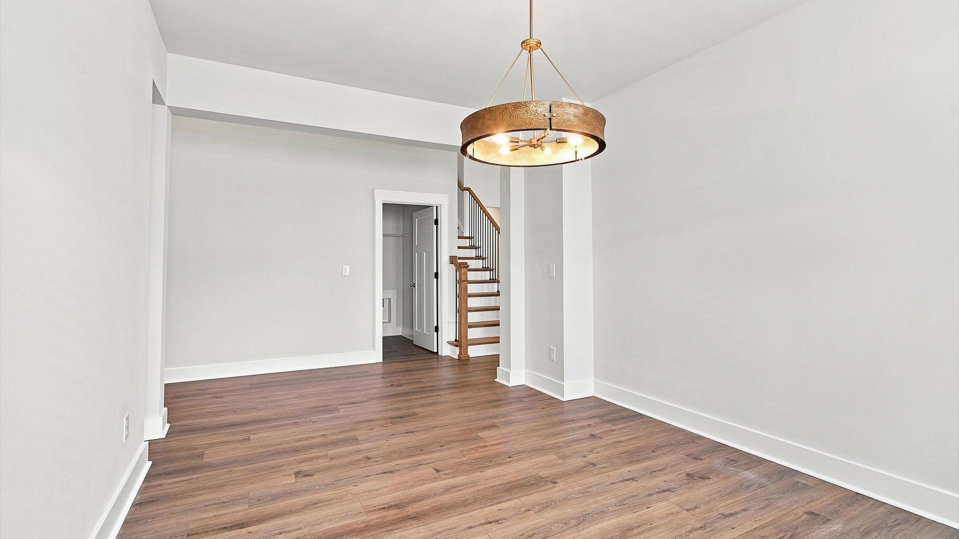 Established charm meets modern elegance in this first-rate dining room by DRB Homes