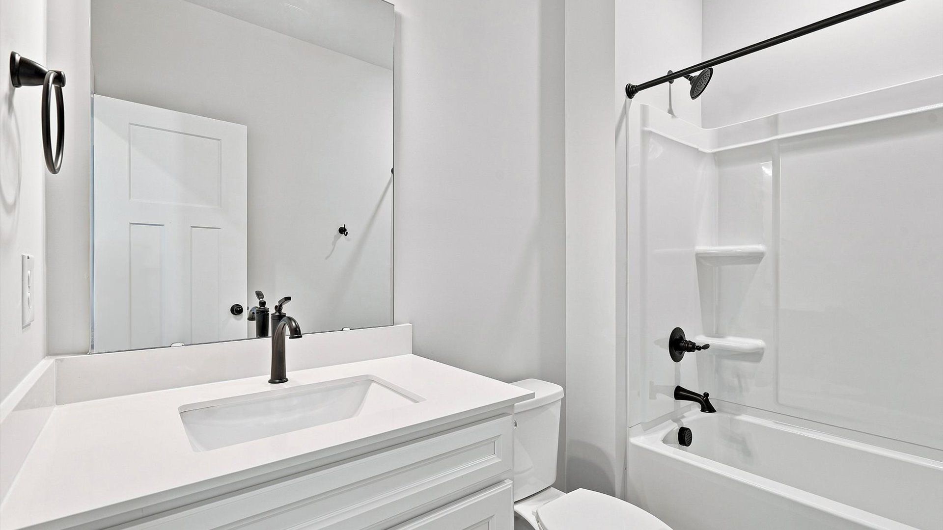 Accomplished full bath designed with both comfort and sophistication in mind