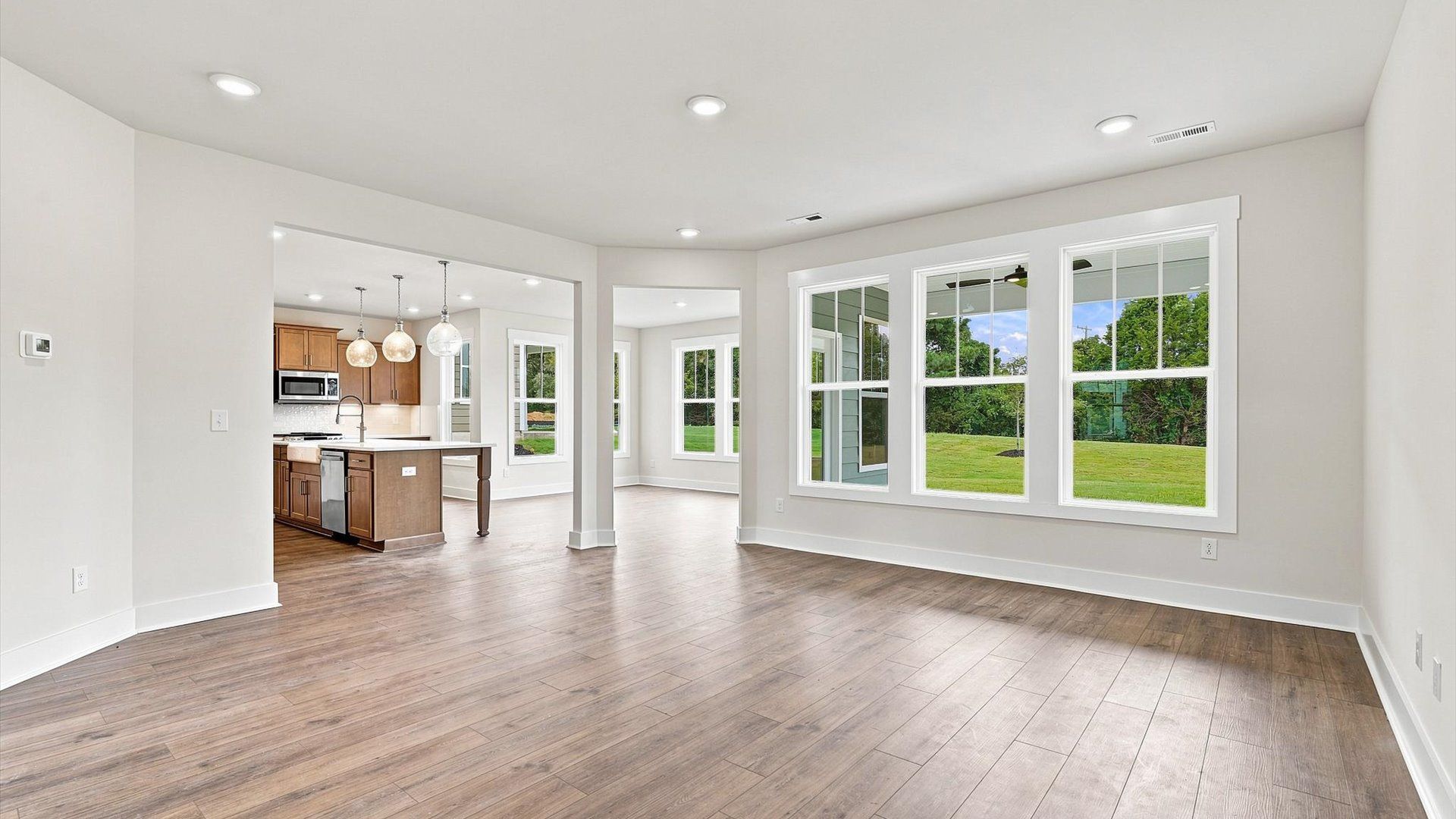 Spacious family room with accomplished design and eye-catching details throughout