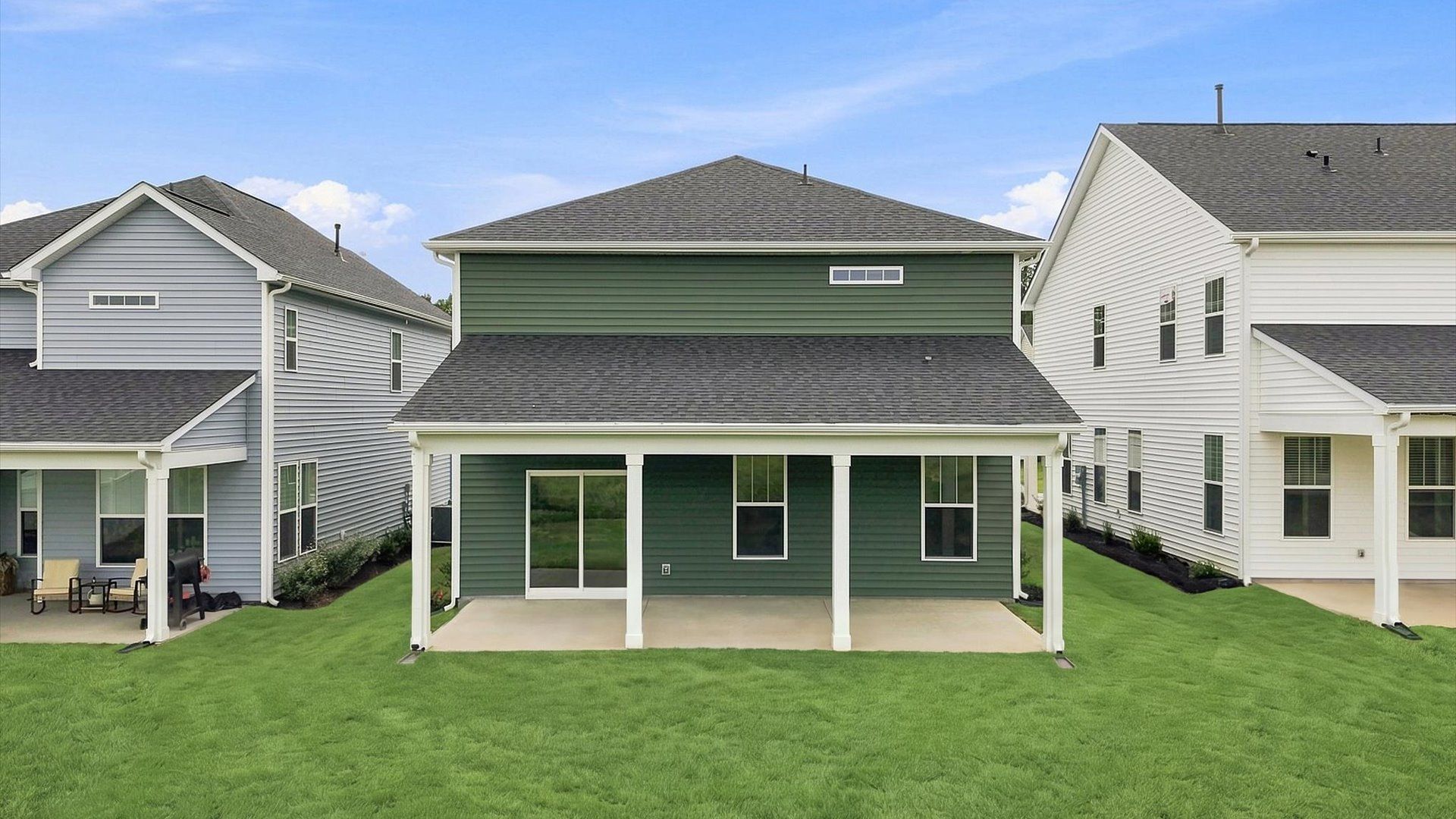 Exclusive rear covered porch with accomplished detail and elevated outdoor living potential