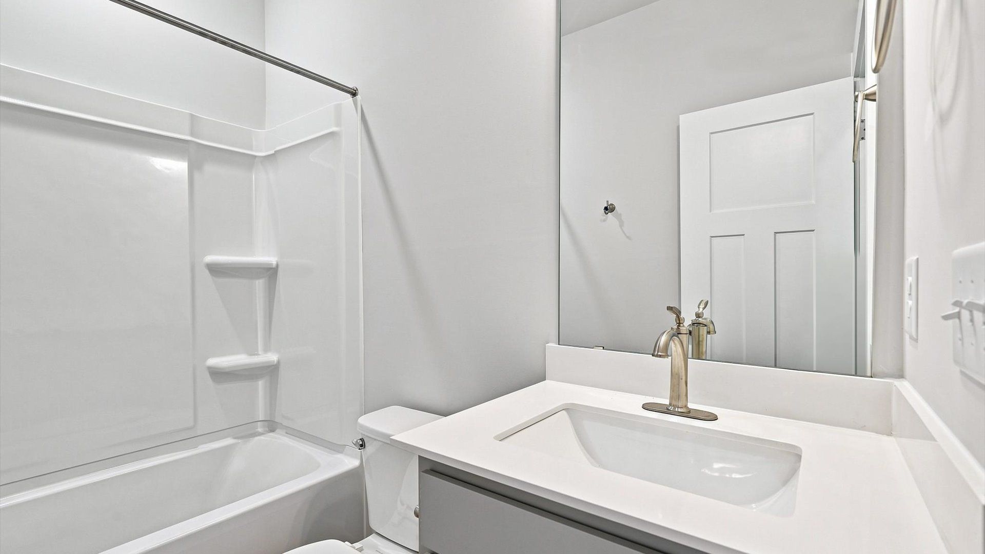 Top-notch bathroom with current fixtures, tasteful materials, and elevated charm