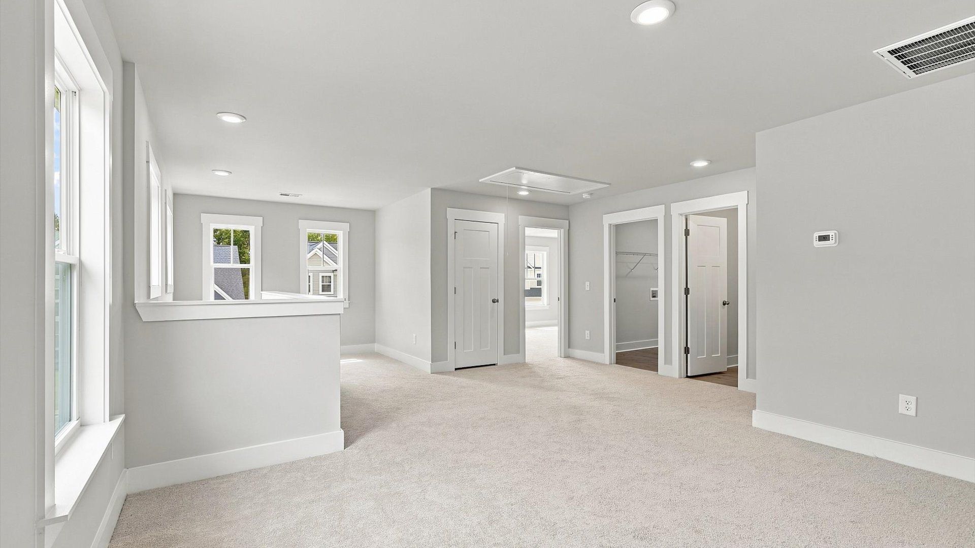 First-rate carpeted loft providing flexible living space for every lifestyle