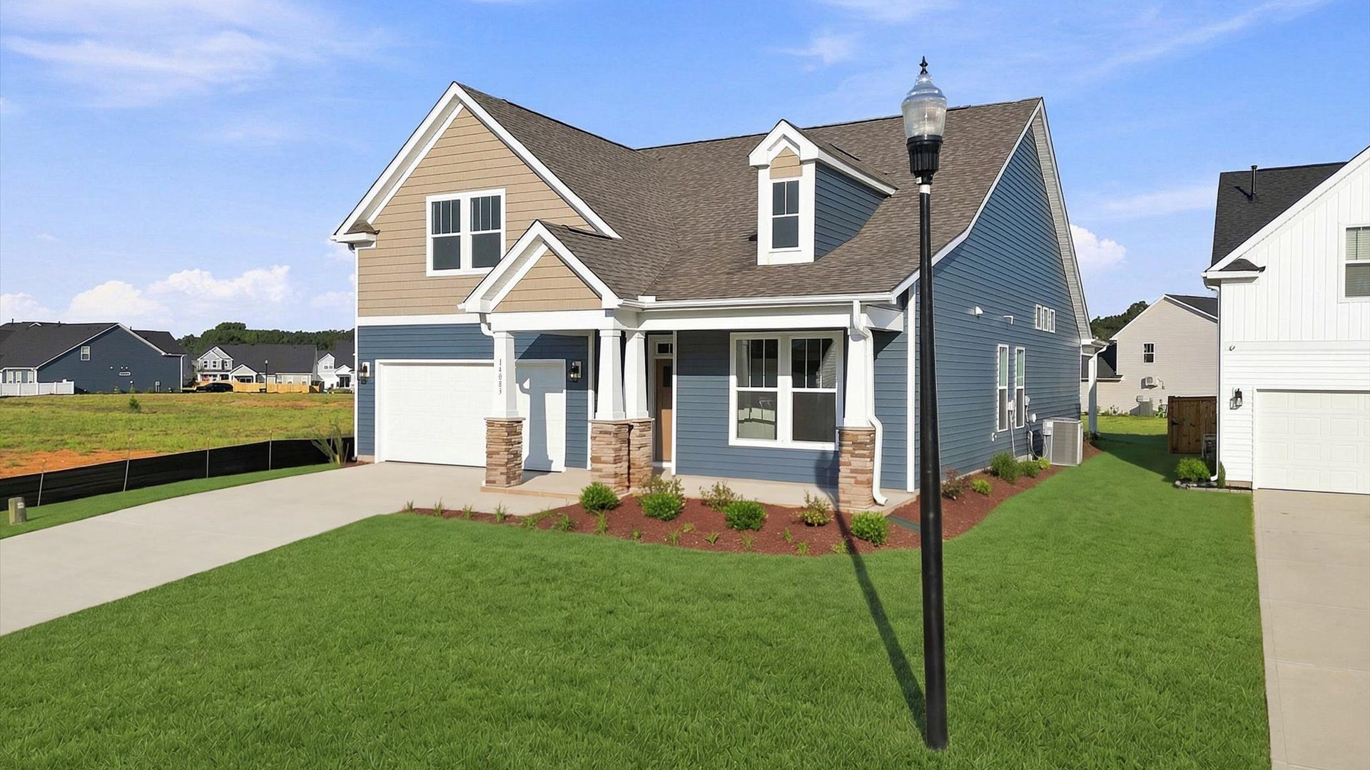 Exceptional home with tasteful exterior finishes and a thoughtfully designed façade located in Inman, SC