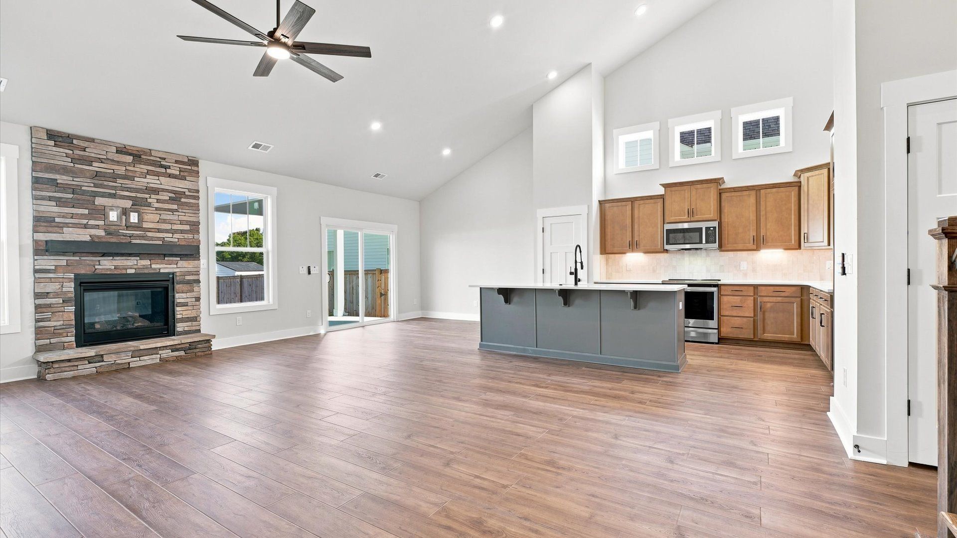 First-rate family room with eye-catching two-story ceilings and superior architectural detail near Lake Bowen
