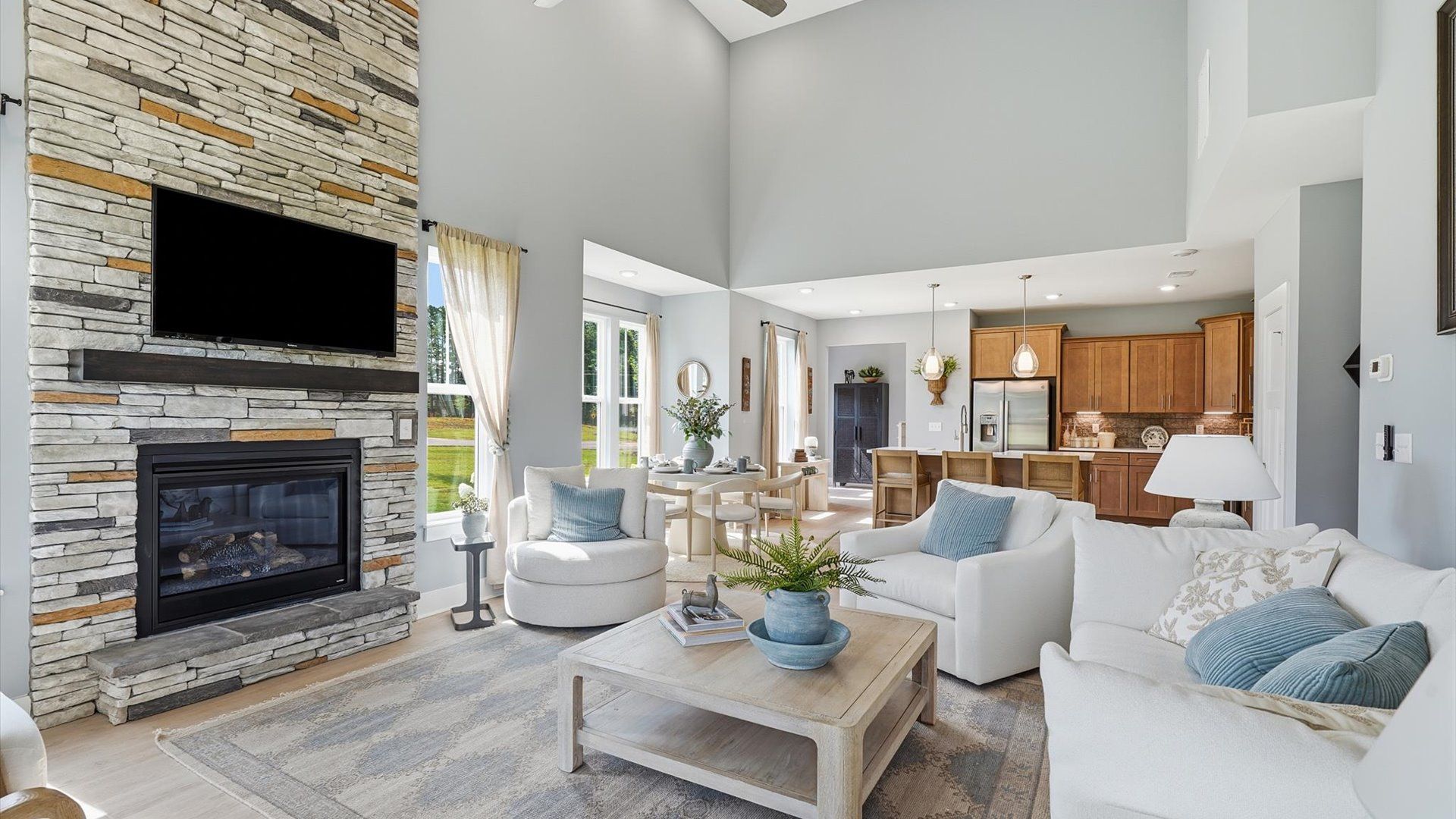 Hardwood flooring and high standards define this vibrant family room ideal for everyday living in Pelzer, SC